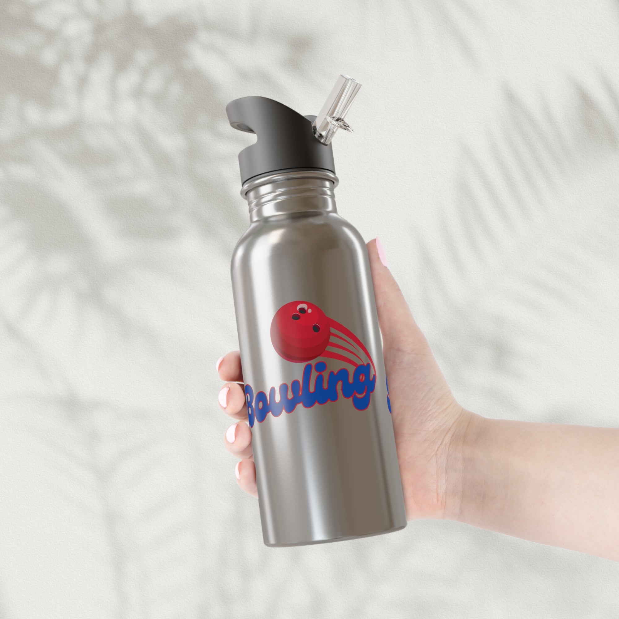 A hand holding a stainless steel water bottle with black lid, with a red bowling ball graphic and 'Bowling' text on a white background