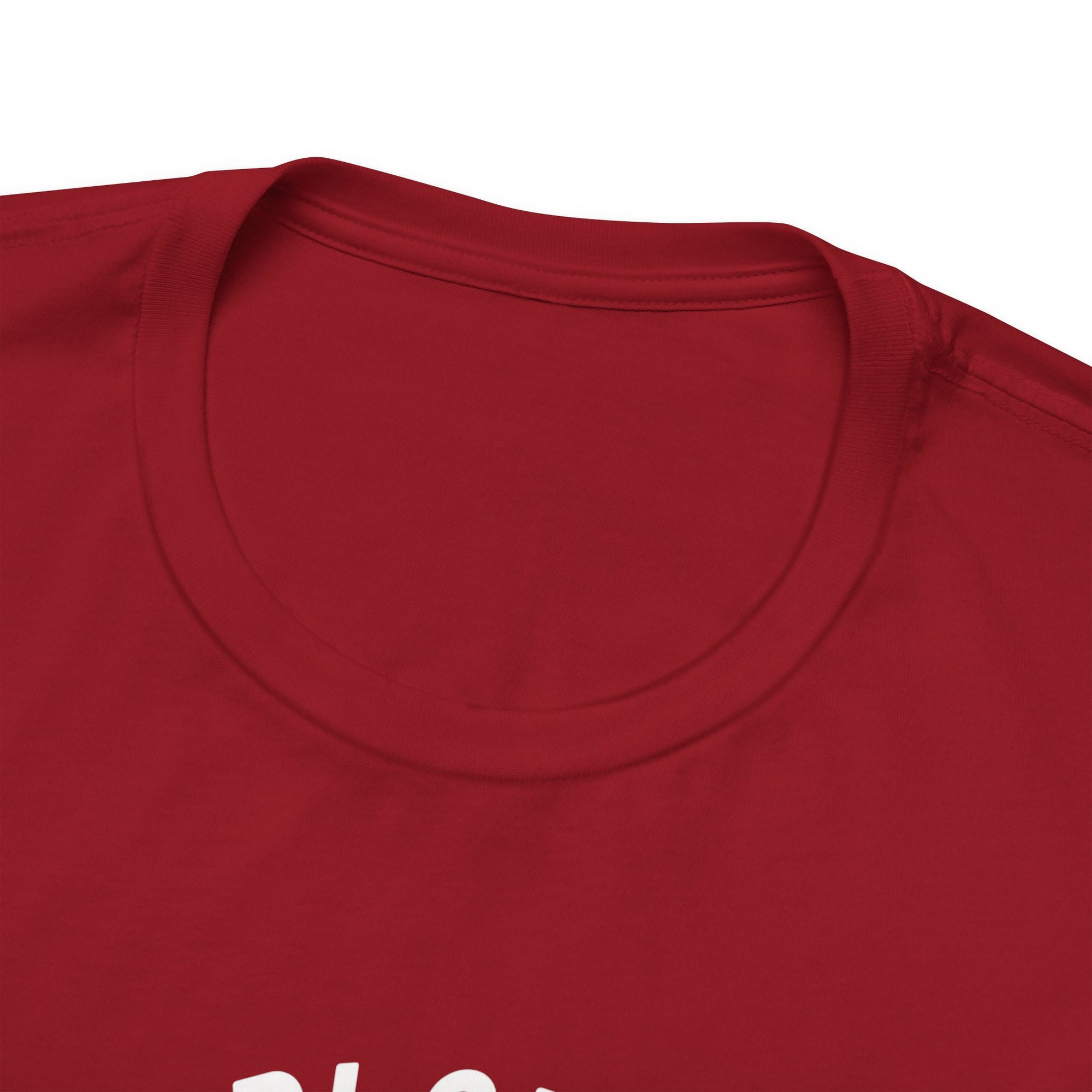 Close-up of a red t-shirt with a brand logo on a white background