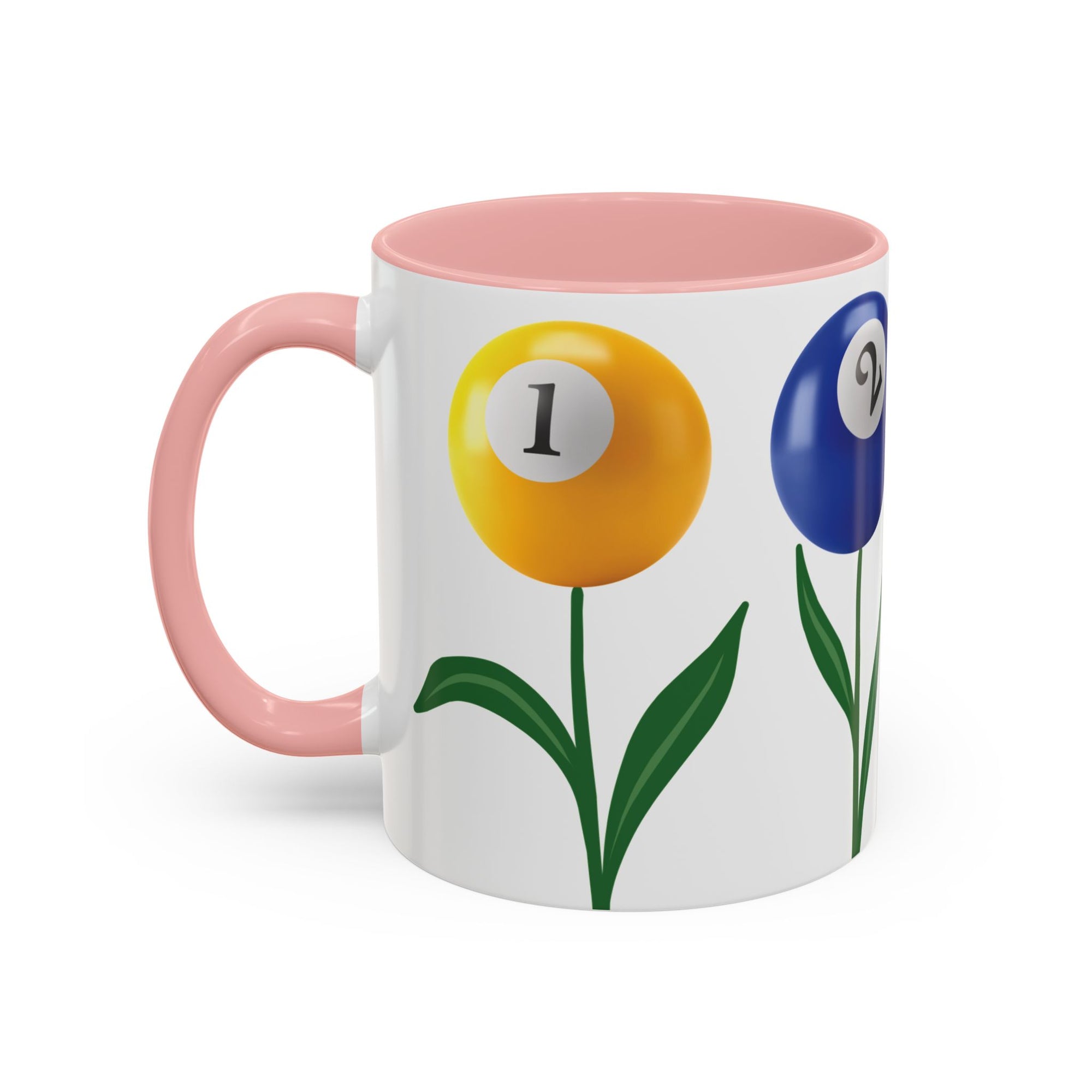 A white ceramic coffee mug with pink accents on the handle and interior, with four colorful flowers made out of billiards balls with green stems, on a white background