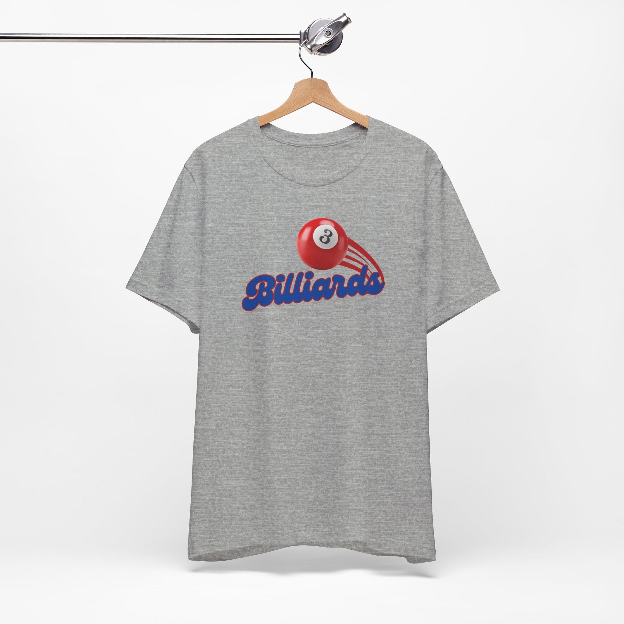 Gray t-shirt with billiards ball and text that says "Billiards" on a hanger against a white background