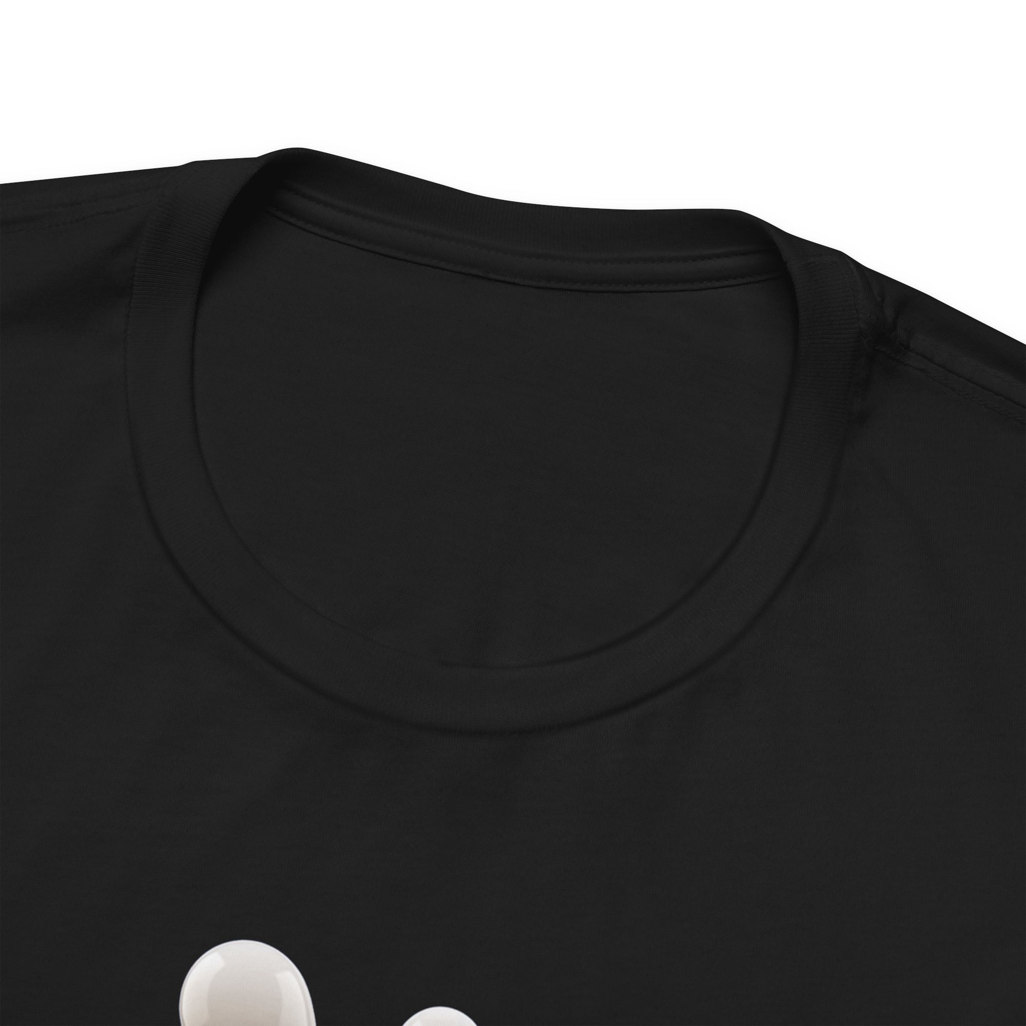 Close-up of the neckline of a black t-shirt with a graphic of a blue bowling ball knocking over bowling pins, on a white background