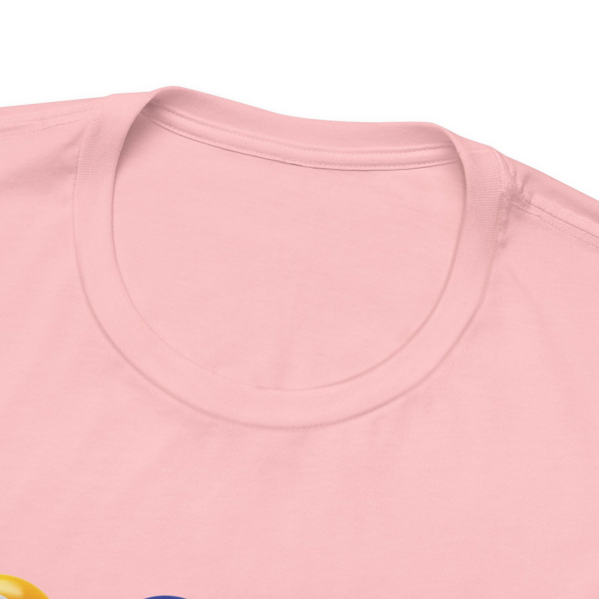 Close-up view of the collar of a pink t-shirt with four colorful flowers made out of billiards balls with green stems, against a white background
