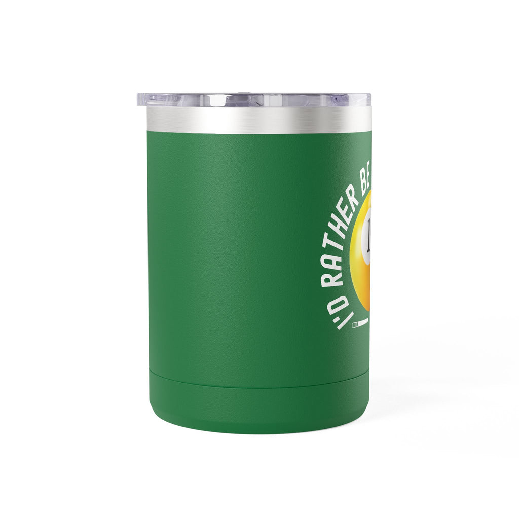 Side view of a green travel coffee mug with lid and handle with a yellow billiards ball and cue stick graphic and the text "I'd Rather Be Shooting Pool" on a white background