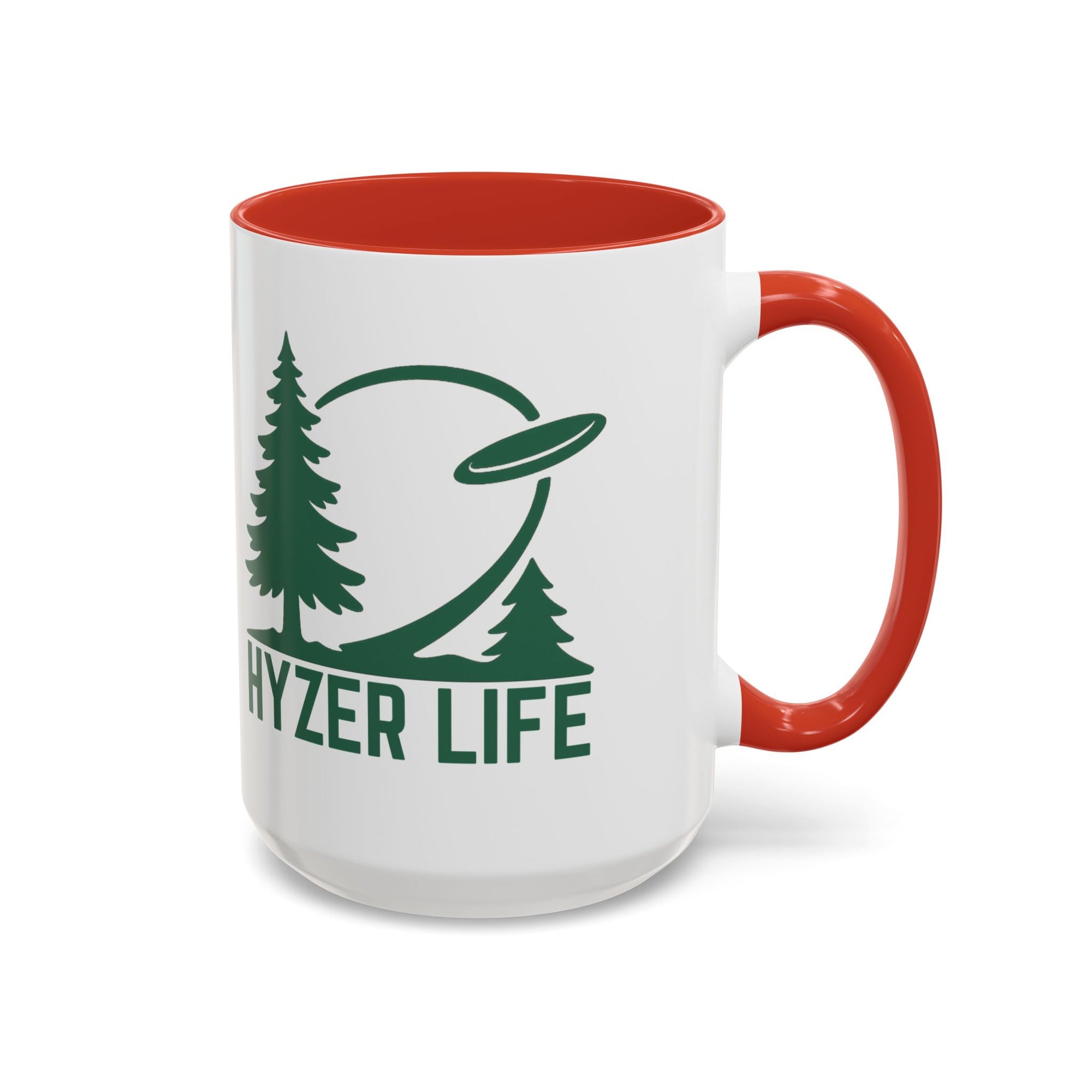 Ceramic coffee mug with red accents on the handle and interior, with green graphic of trees and a disc golf flying with the words 'HYZER LIFE' below the image, against a white background