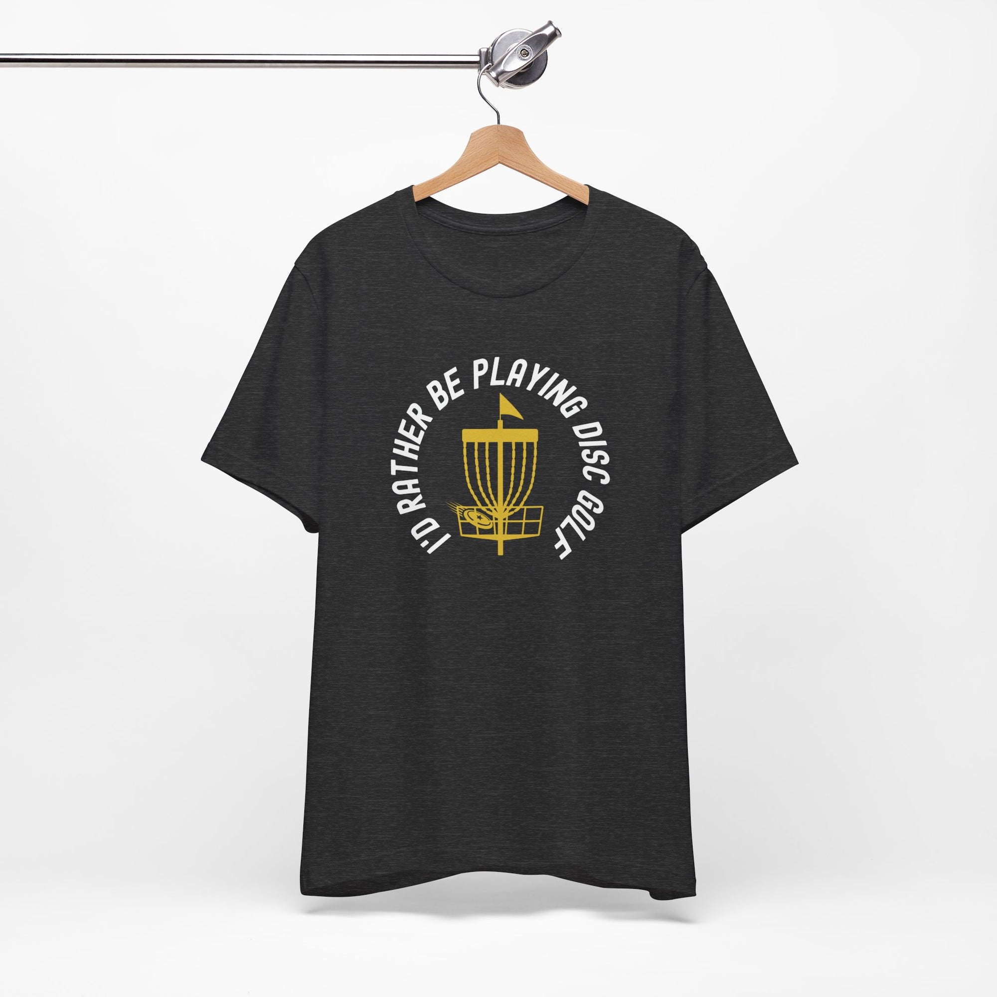 Dark gray t-shirt with a graphic of disc golf chains, basket, and disc and text that says "I'd Rather Be Playing Disc Golf" on a hanger against a white background