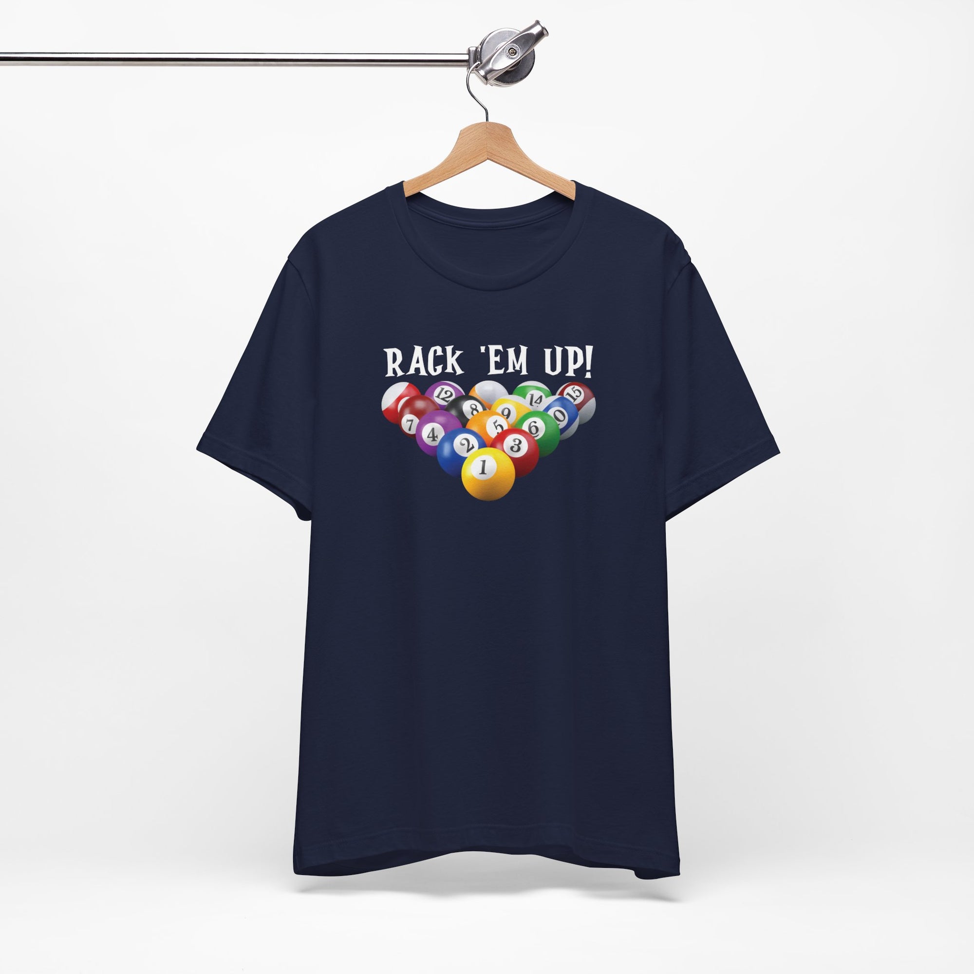 Navy blue t-shirt with racked pool ball design and 'Rack 'Em Up!' text, on a hanger against a white background