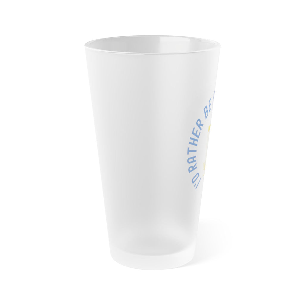 Side view of a frosted pint glass with disc golf chains and basket with the text "I'd Rather Be Playing Disc Golf" surrounding them, on a white background