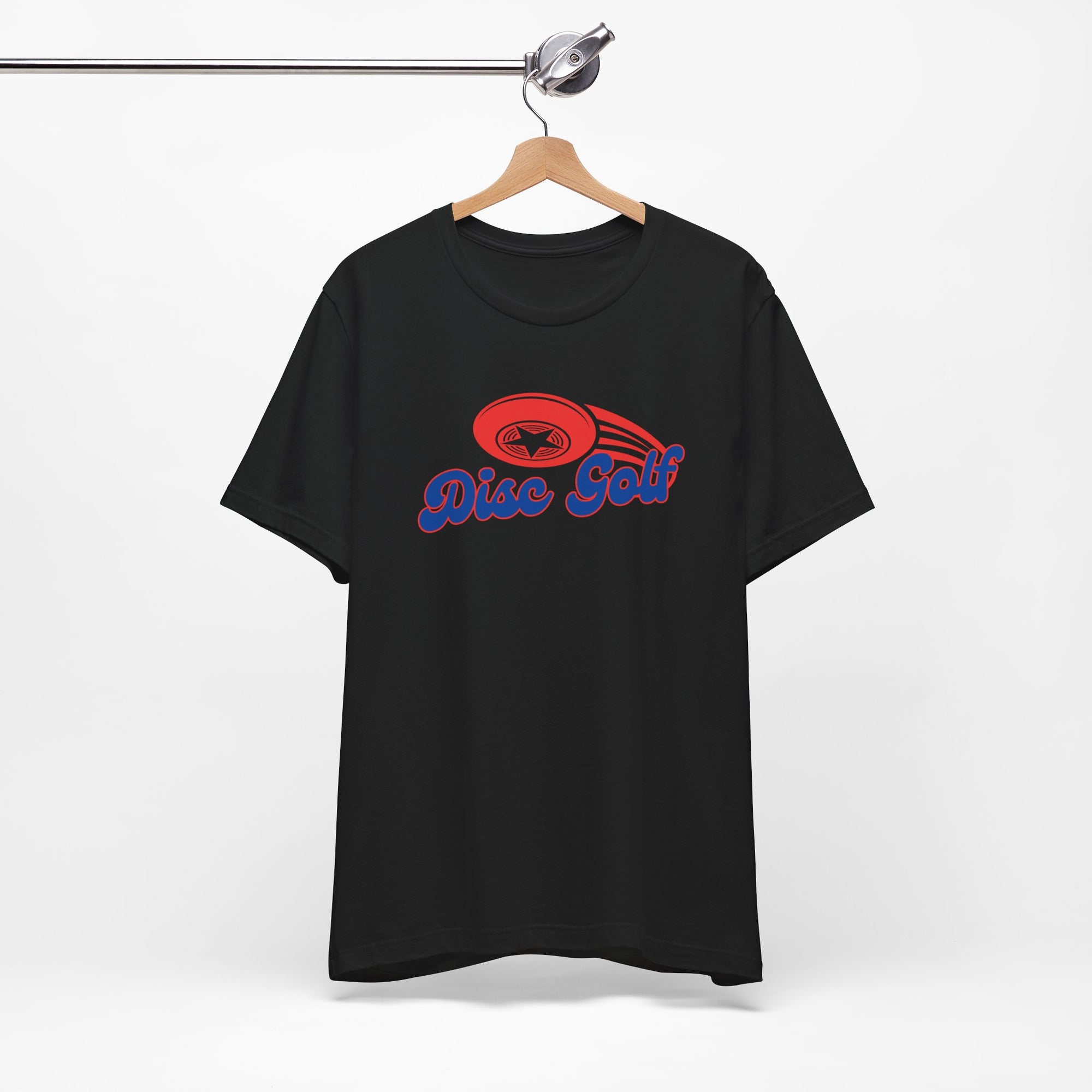 Black t-shirt with 'Disc Golf' in a blue script text outlined in red and disc golf with motion trails, on a hanger against a white background