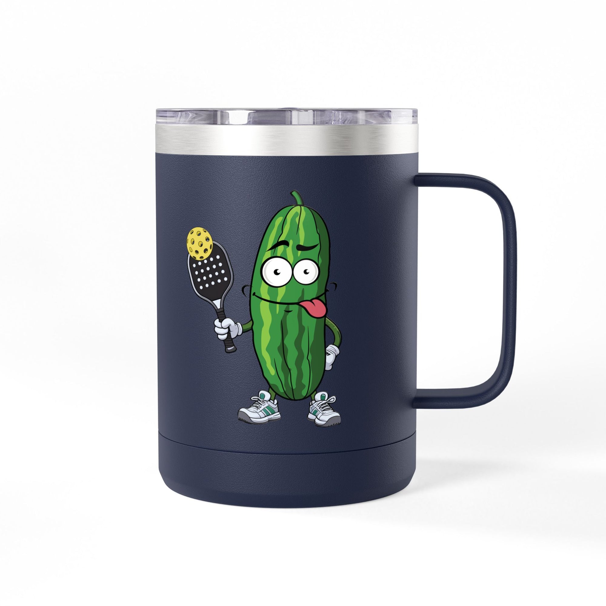 A navy blue travel coffee mug tumbler with handle and lid with a cartoon pickle with googly eyes and his tongue sticking out, holding a pickleball paddle with a yellow pickleball, against a white background