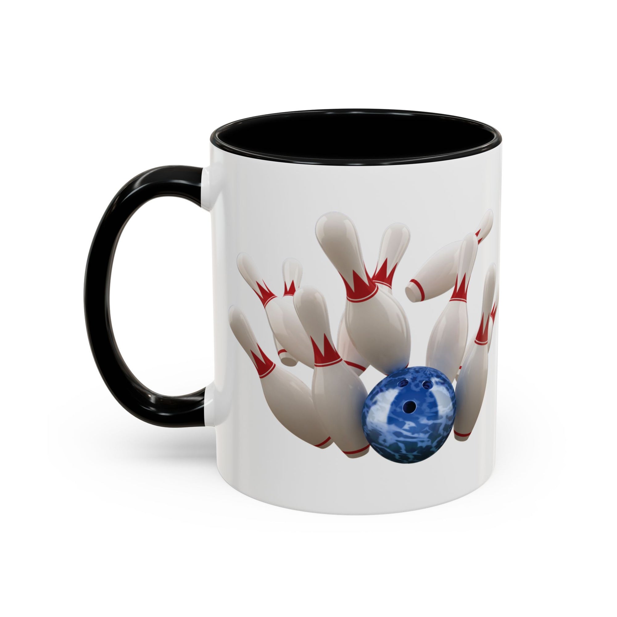 A white ceramic coffee mug with black accents on the handle and interior, with a graphic of a blue bowling ball knocking over bowling pins, on a white background