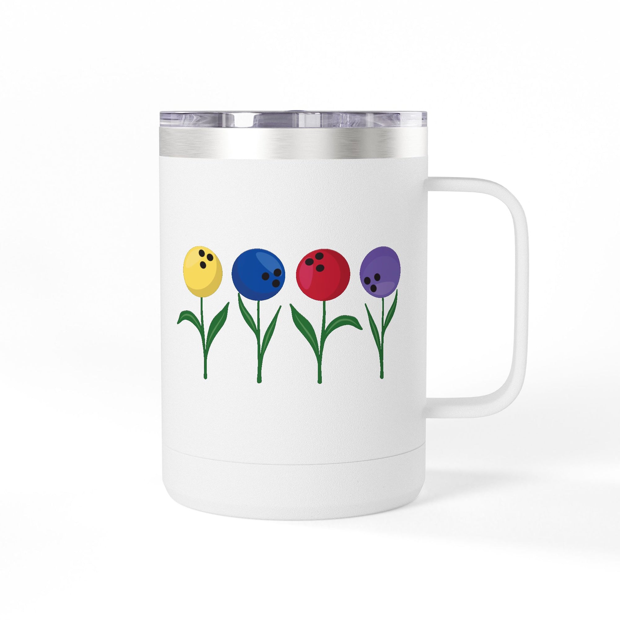 A white travel mug tumbler with lid and handle, with colorful flowers made out of bowling balls, on a white background