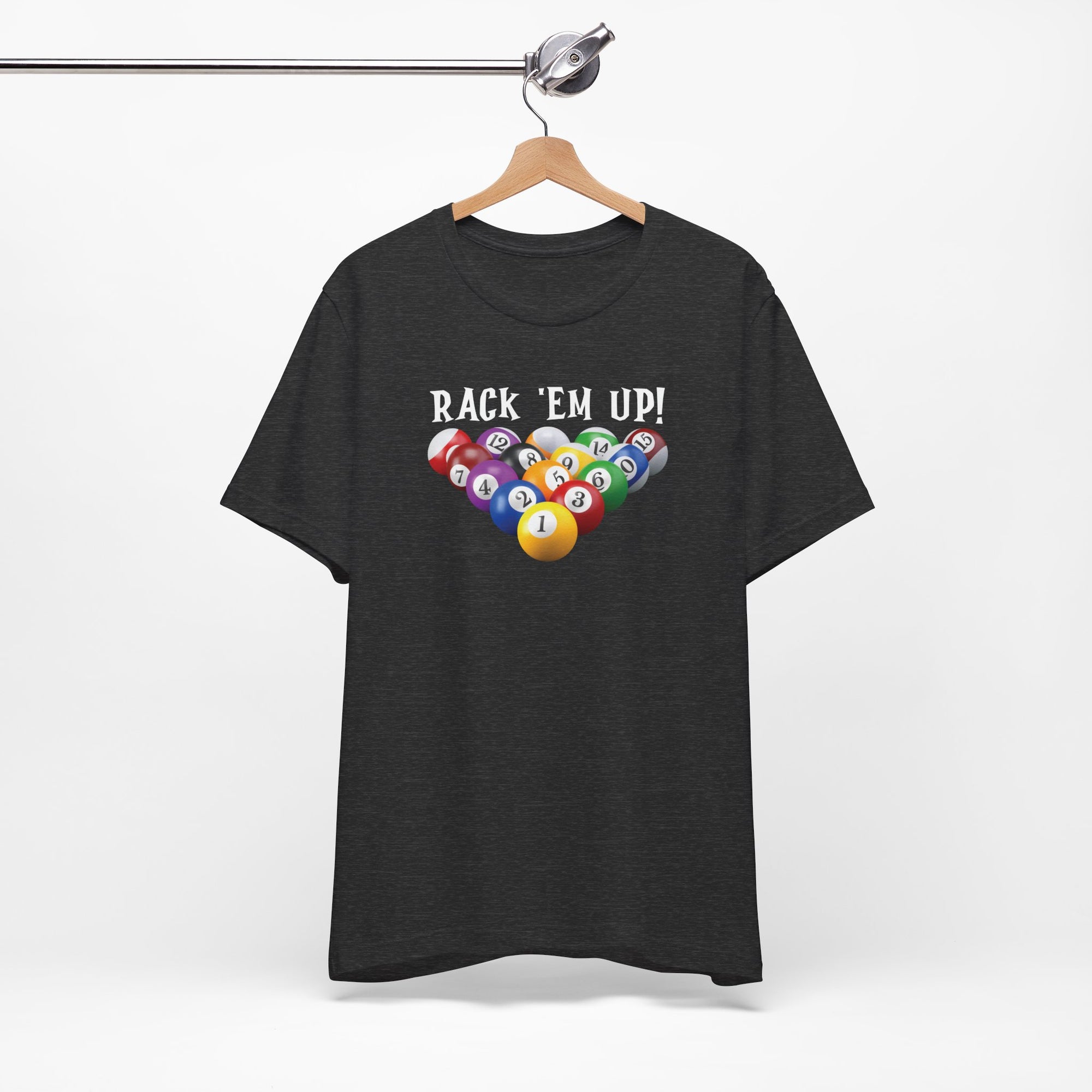 Dark gray t-shirt with racked pool ball design and 'Rack 'Em Up!' text, on a hanger against a white background