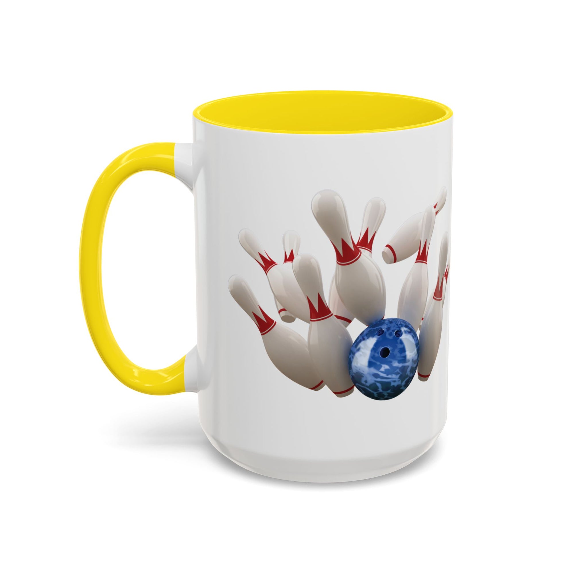 A white ceramic coffee mug with yellow accents on the handle and interior, with a graphic of a blue bowling ball knocking over bowling pins, on a white background
