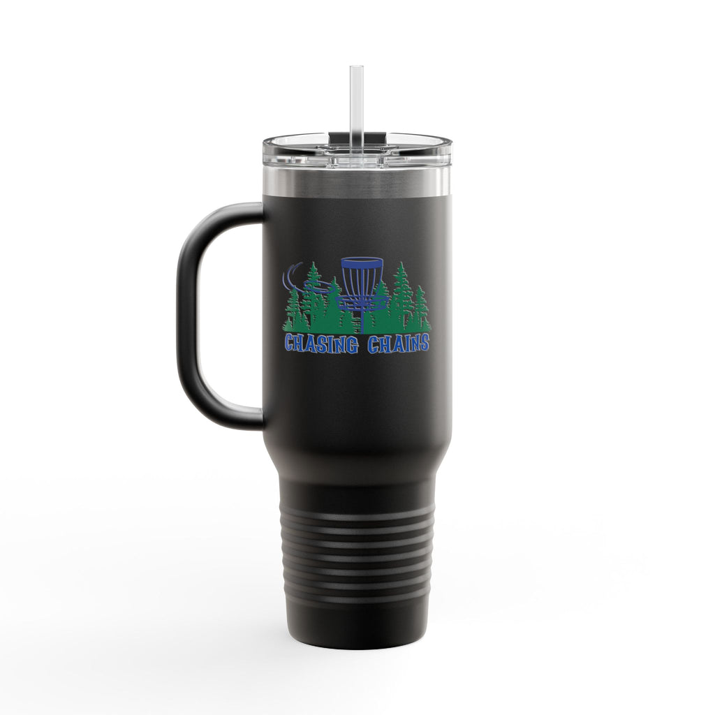 A black 40oz travel tumbler with lid and straw, with 'Chasing Chains' graphic featuring a flying disc golf disc and basket and chains in front of a scenic evergreen tree landscape, against a white background