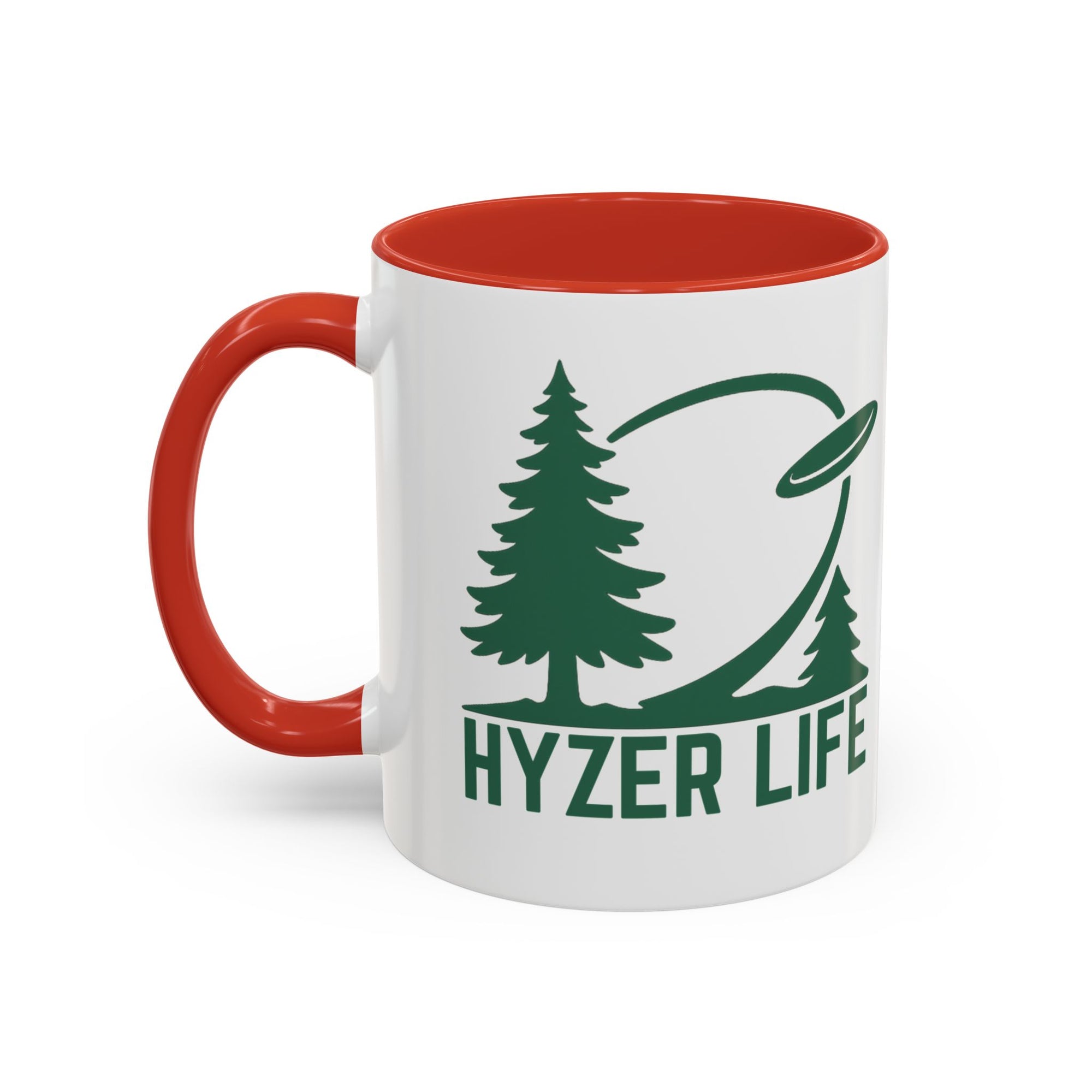 Ceramic coffee mug with red accents on the handle and interior, with green graphic of trees and a disc golf flying with the words 'HYZER LIFE' below the image, against a white background