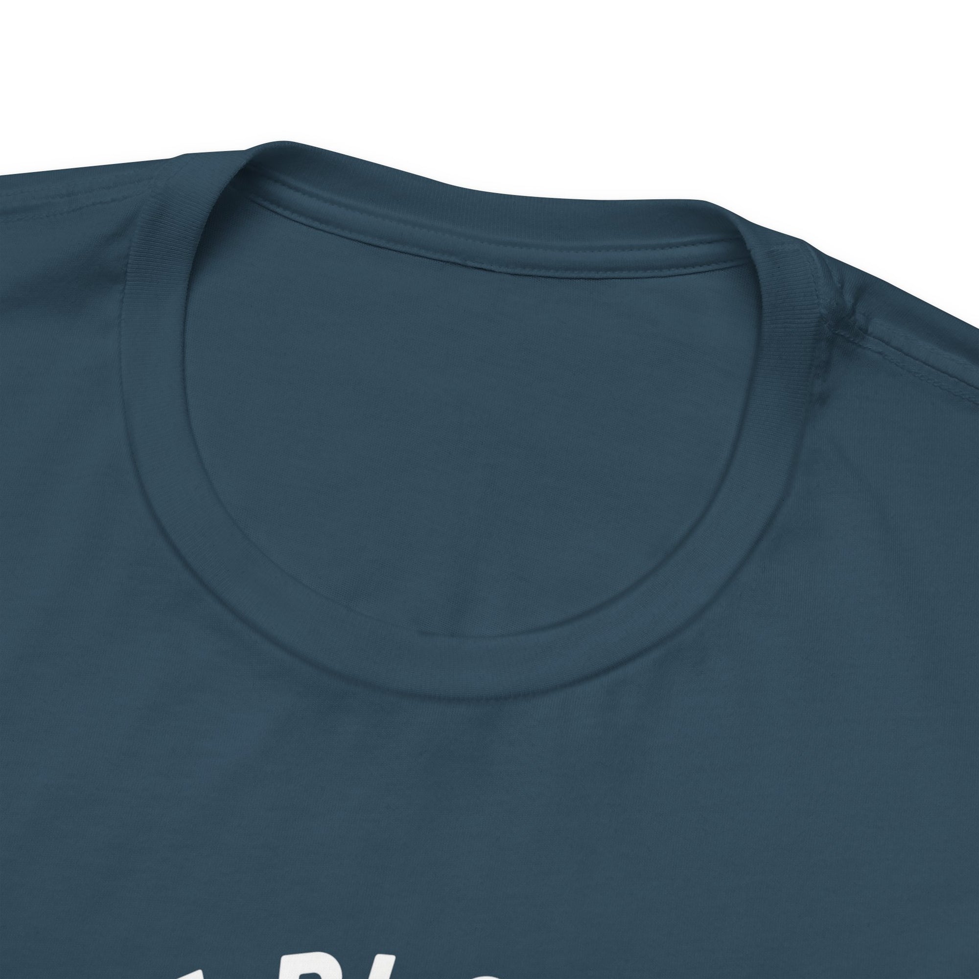 Close-up of a teal t-shirt with a collar detail on a white background
