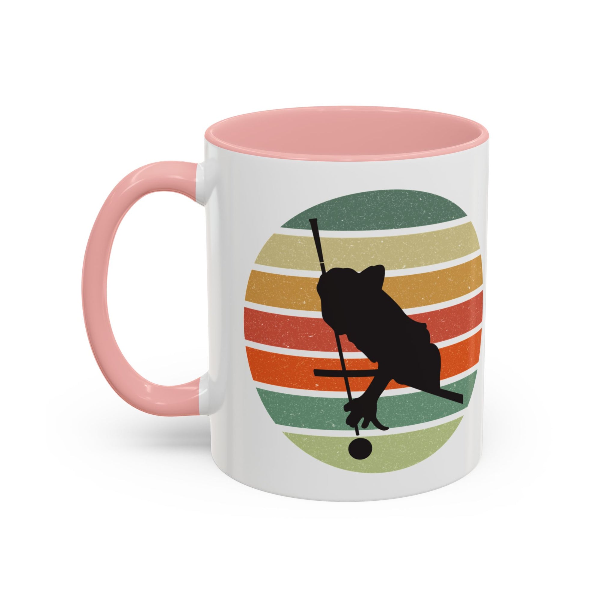 Mug with pink accents and a graphic of a billiards player silhouette over a colorful retro design on a white background.