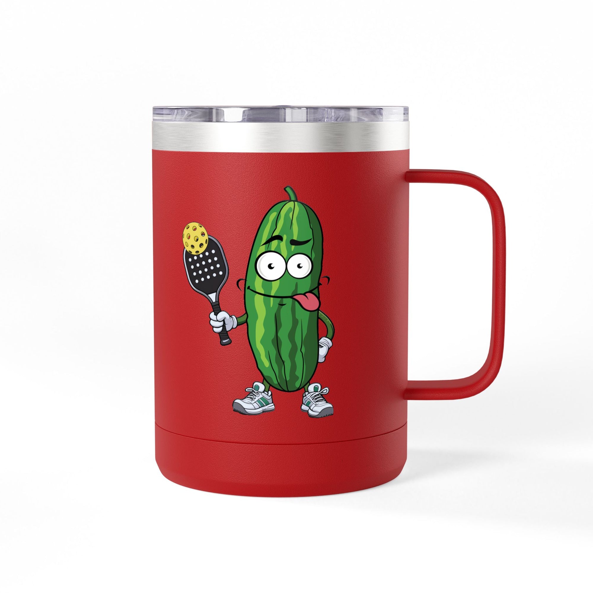 A red travel coffee mug tumbler with handle and lid with a cartoon pickle with googly eyes and his tongue sticking out, holding a pickleball paddle with a yellow pickleball, against a white background