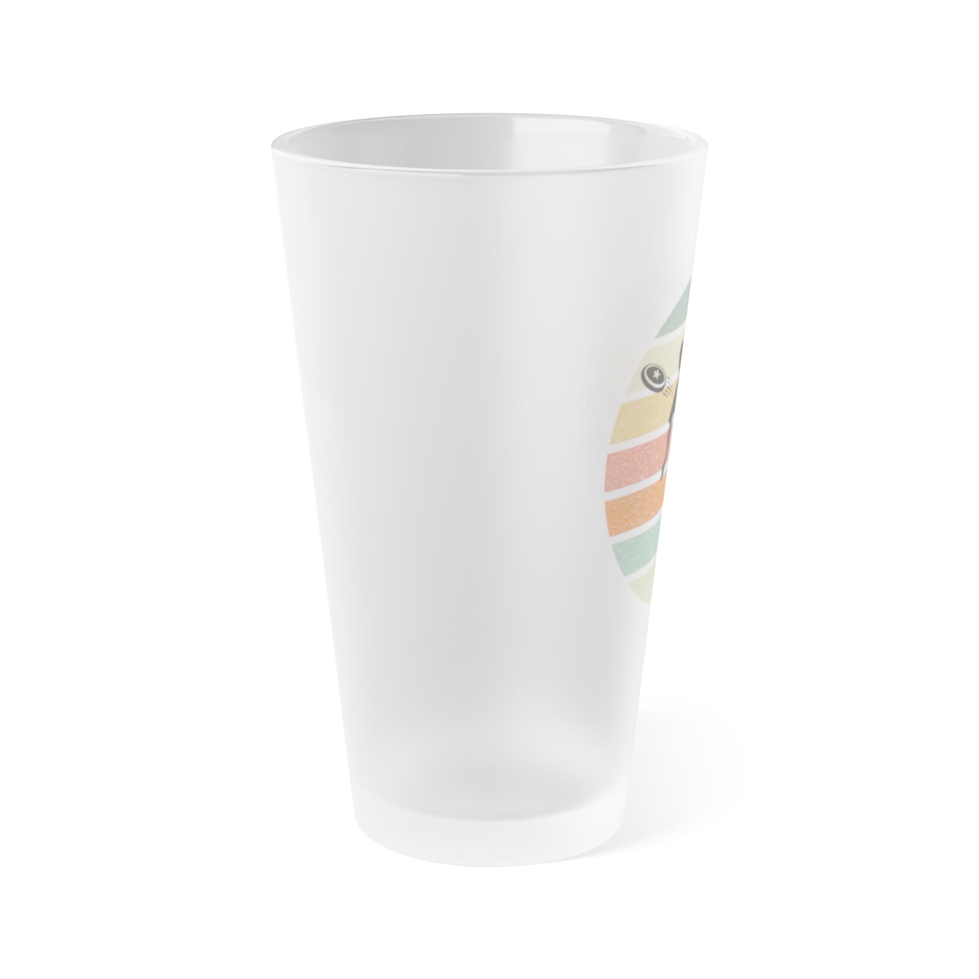 Side view of a frosted pint glass featuring a disc golf player silhouette in black in front of a circle of colorful lines, on a white background