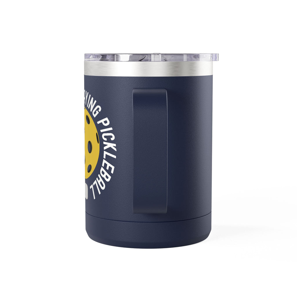 Back view of a blue travel mug with lid with a yellow pickleball graphic and the text "I'd Rather Be Playing Pickleball" on a white background