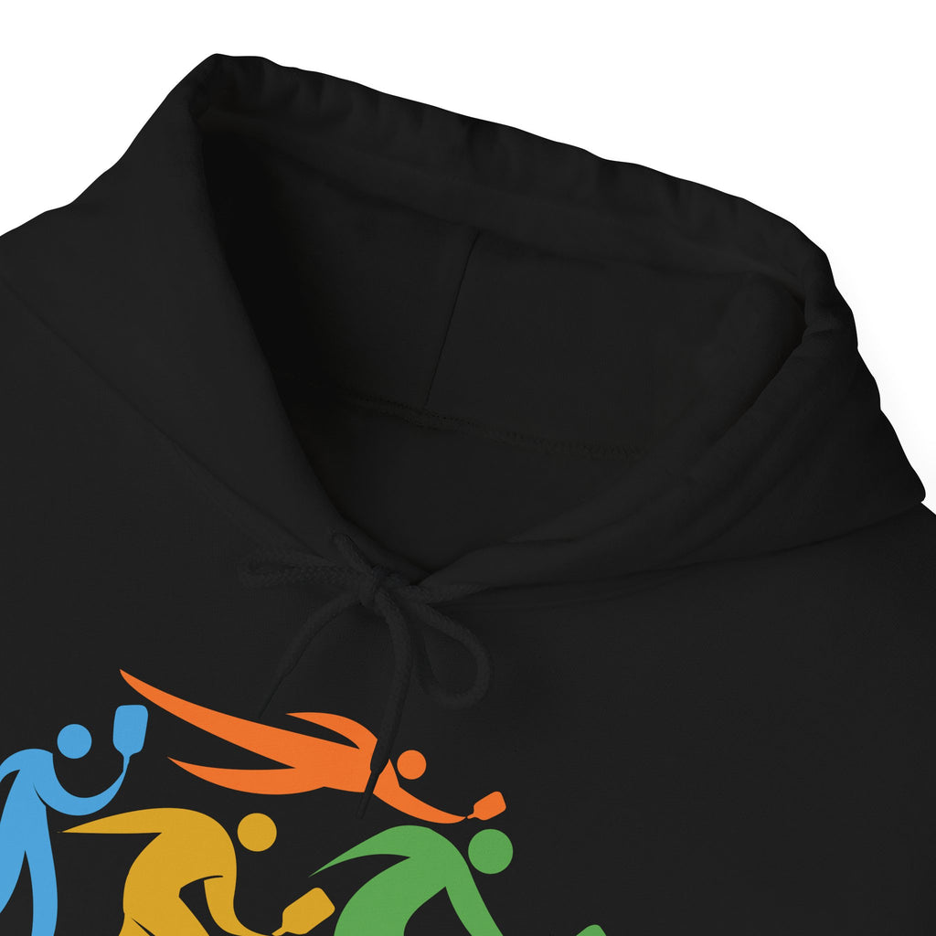 The neckline of a black hoodie featuring an image of four colorful pickleball player drawings playing pickleball against a white background