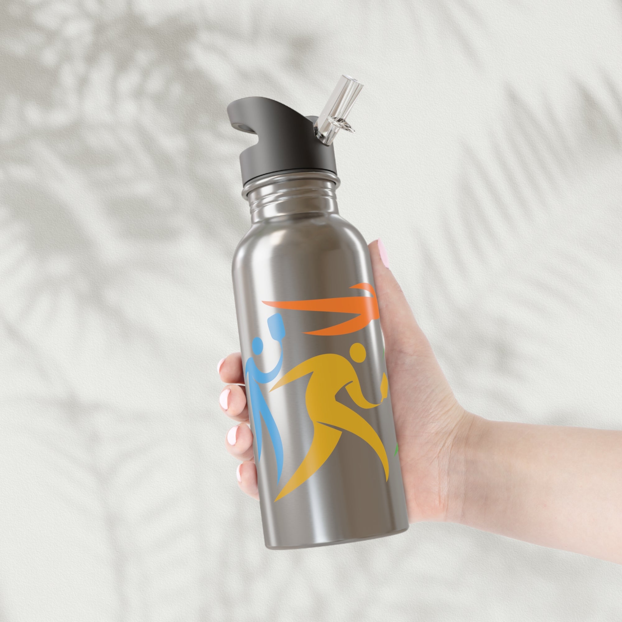 A hand holding a stainless steel water bottle with lid,  featuring an image of four colorful pickleball player drawings playing pickleball against a white background
