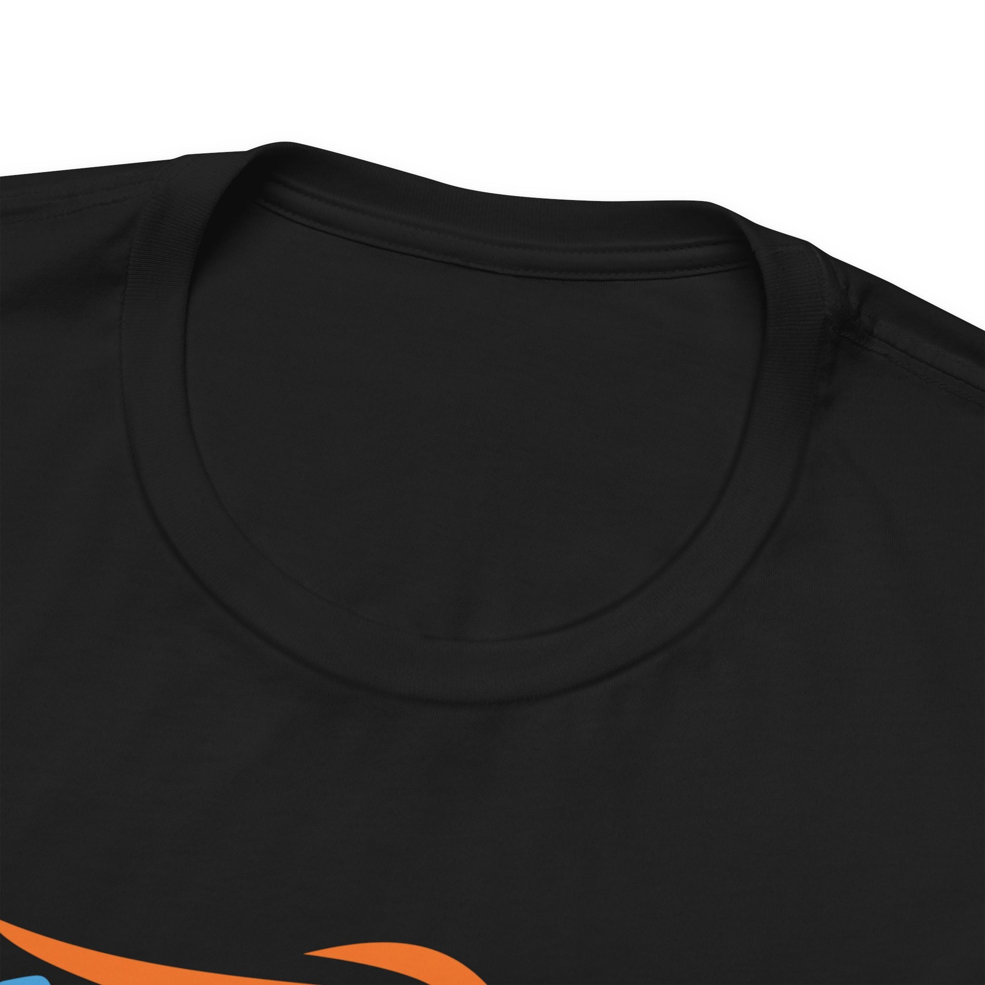 The neckline of a black t-shirt featuring an image of four colorful pickleball player drawings playing pickleball, on a hanger against a white background