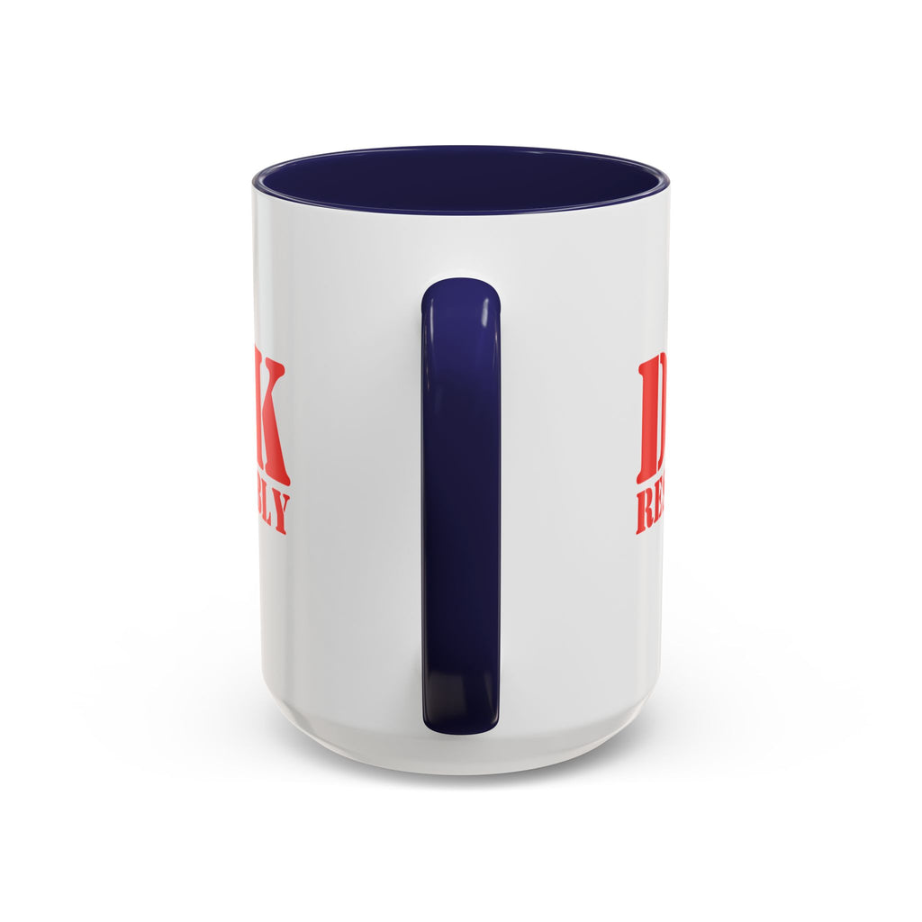 The back view of a ceramic coffee mug with dark blue accents on the handle and interior, with red text 'DINK RESPONSIBLY' with a pickleball replacing the "O" in "Responsibly" against a white background