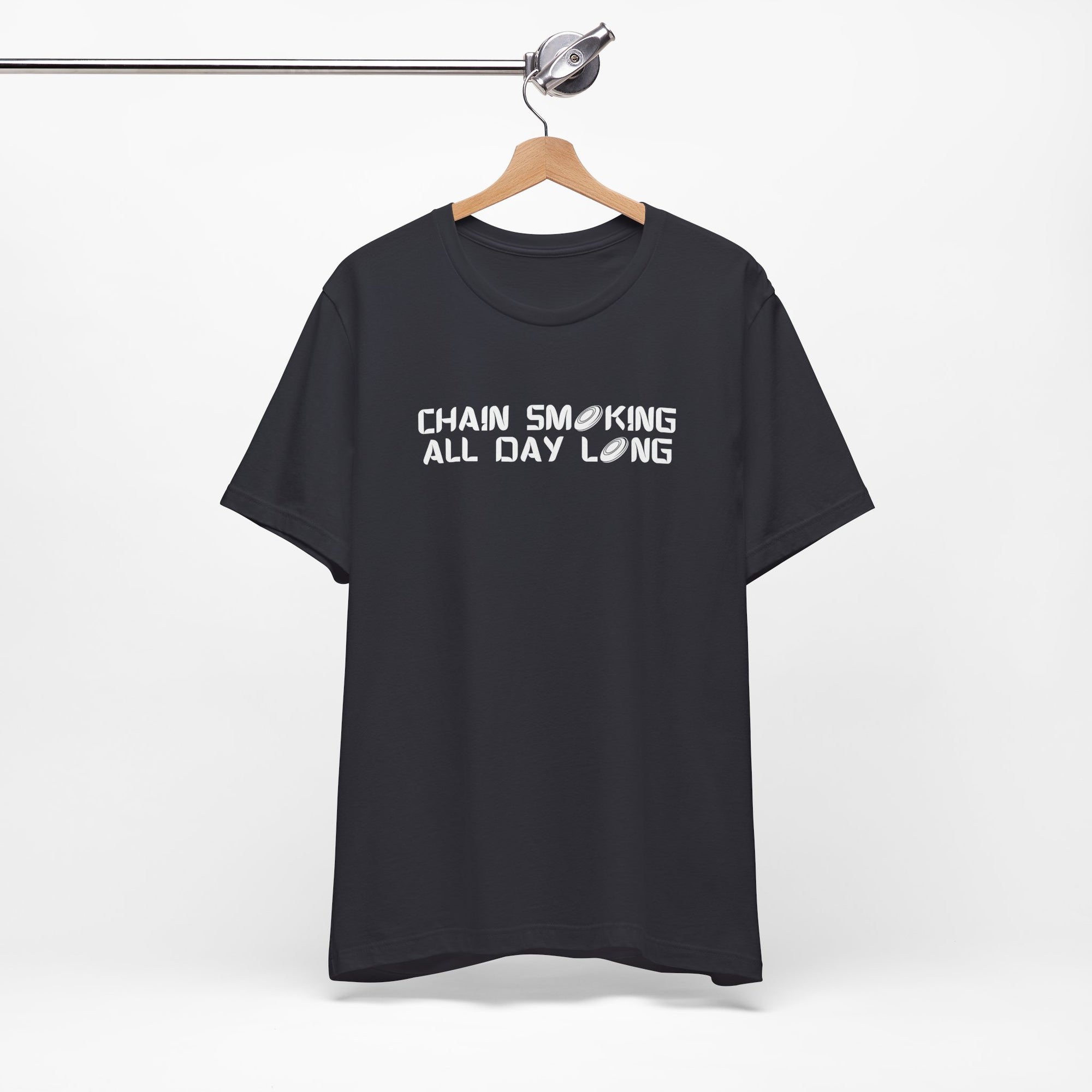 Gray t-shirt with 'CHAIN SMOKING ALL DAY LONG' text with the O's replaced by disc golf discs, on a hanger against a white background