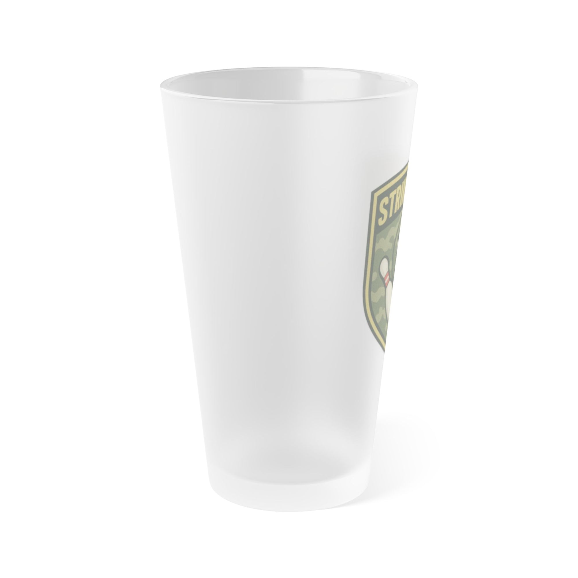 Side view of a frosted pint glass with bowling 'Strike Force' military-style patch on a white background