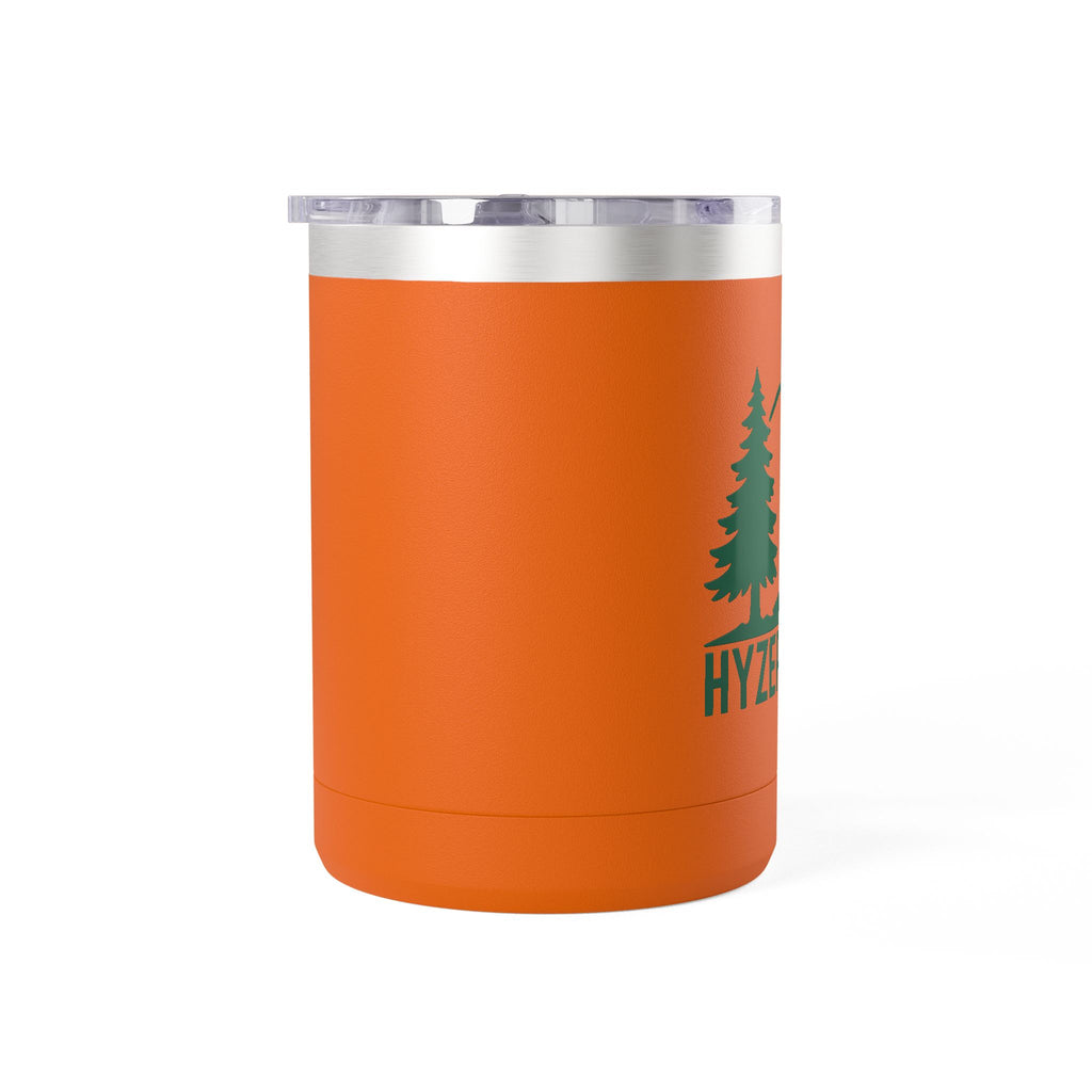 Side view of an orange stainless steel coffee tumbler with lid and handle with green graphic of trees and a disc golf flying with the words 'HYZER LIFE' below the image, on a white background 