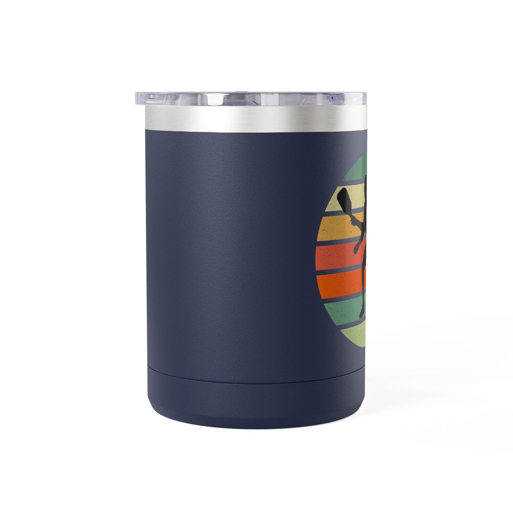 Navy blue mug with a graphic of a person's silhouette playing pickleball on a retro color background