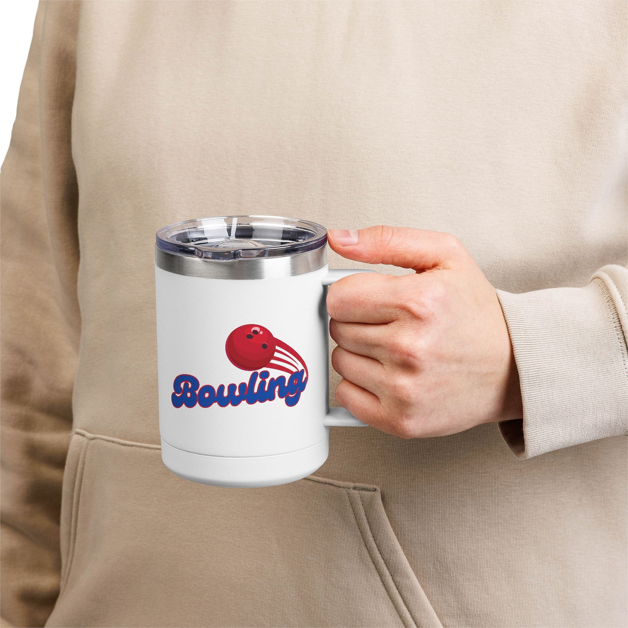 A person holding a white travel mug with lid and handle with red bowling ball and blue 'Bowling' text
