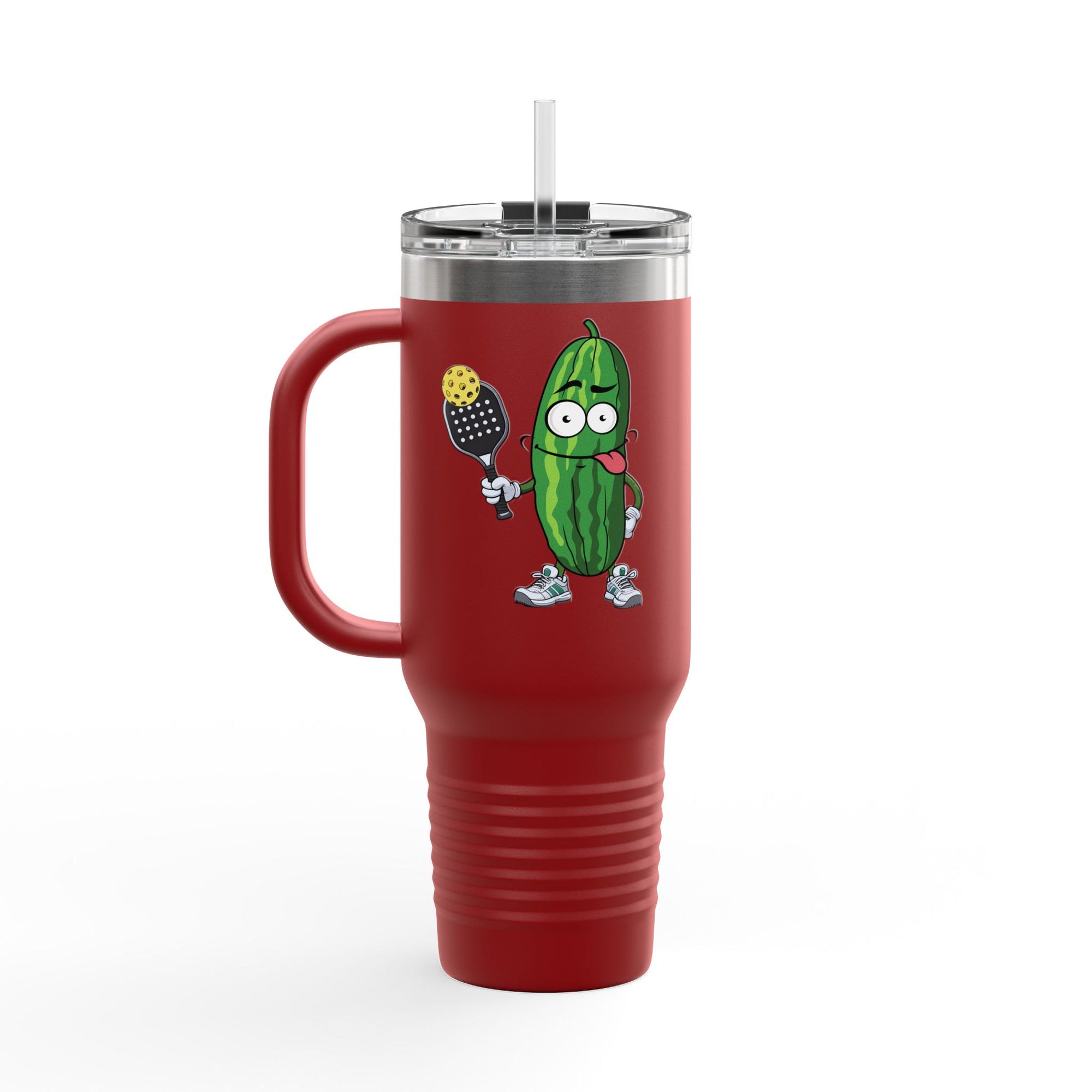 A red 40oz tumbler with lid and straw featuring a cartoon pickle with googly eyes and his tongue sticking out, holding a pickleball paddle with a yellow pickleball, against a white background