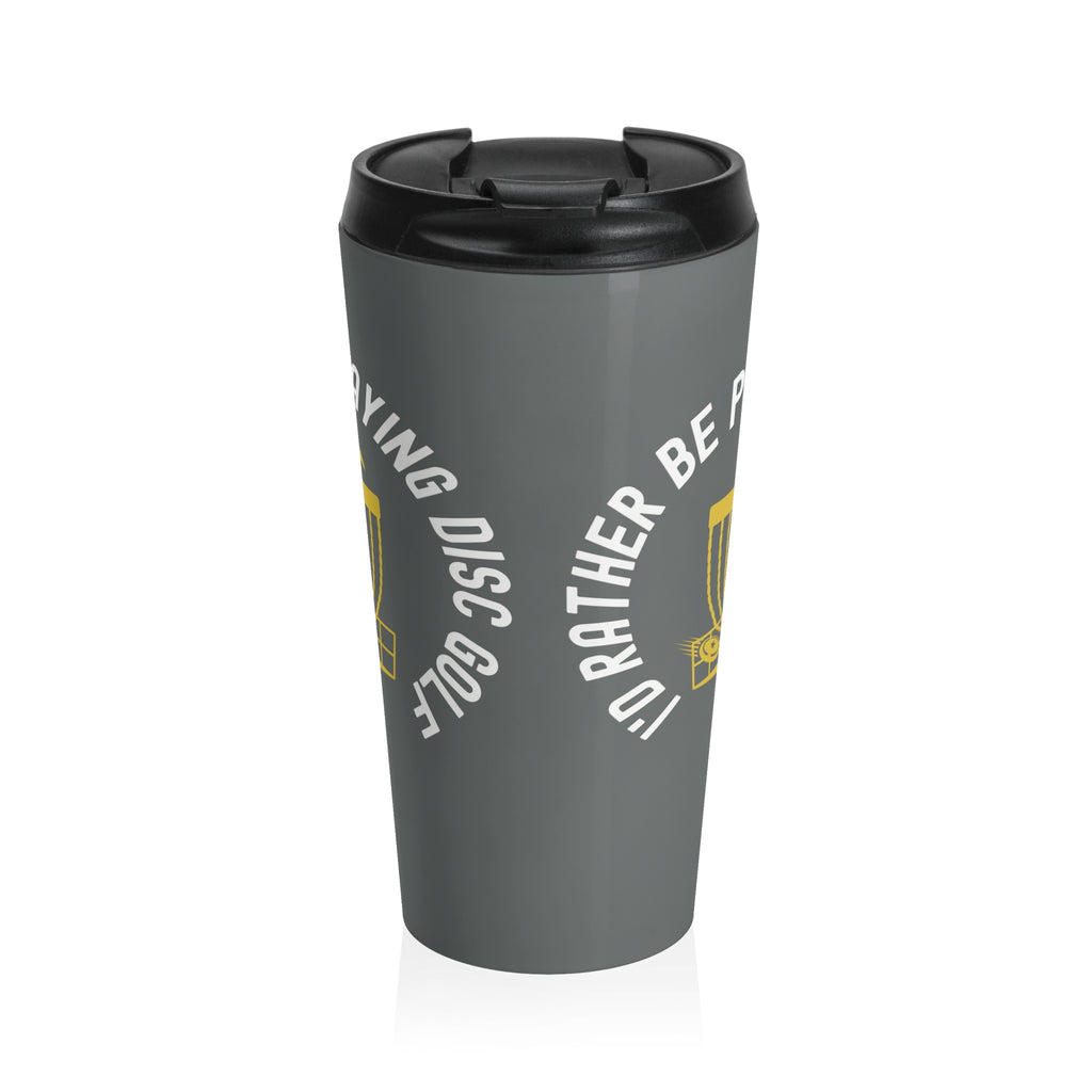 Side view of a gray travel mug with lid with a graphic of disc golf chains, basket, and disc and text that says "I'd Rather Be Playing Disc Golf" on a white background