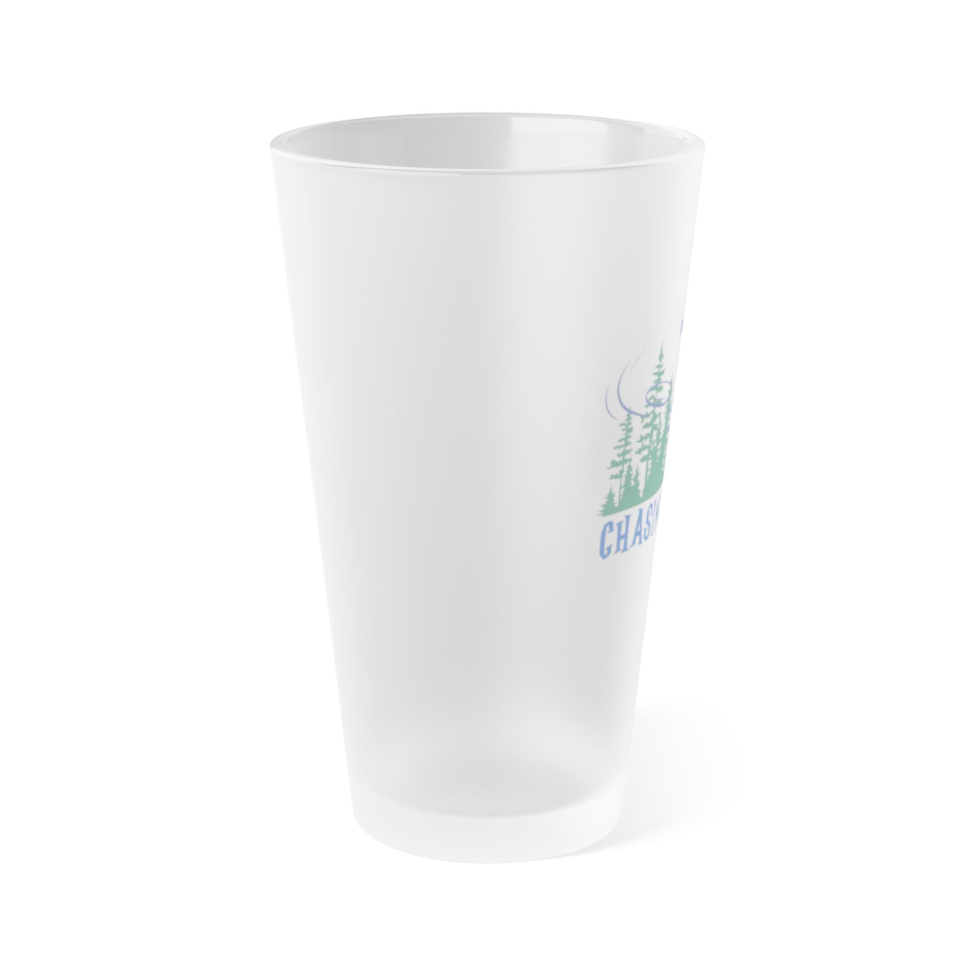Side view of a frosted pint glass with a flying disc golf disc, basket, and chains in front of trees, with "Chasing Chains" below the design, on a white background