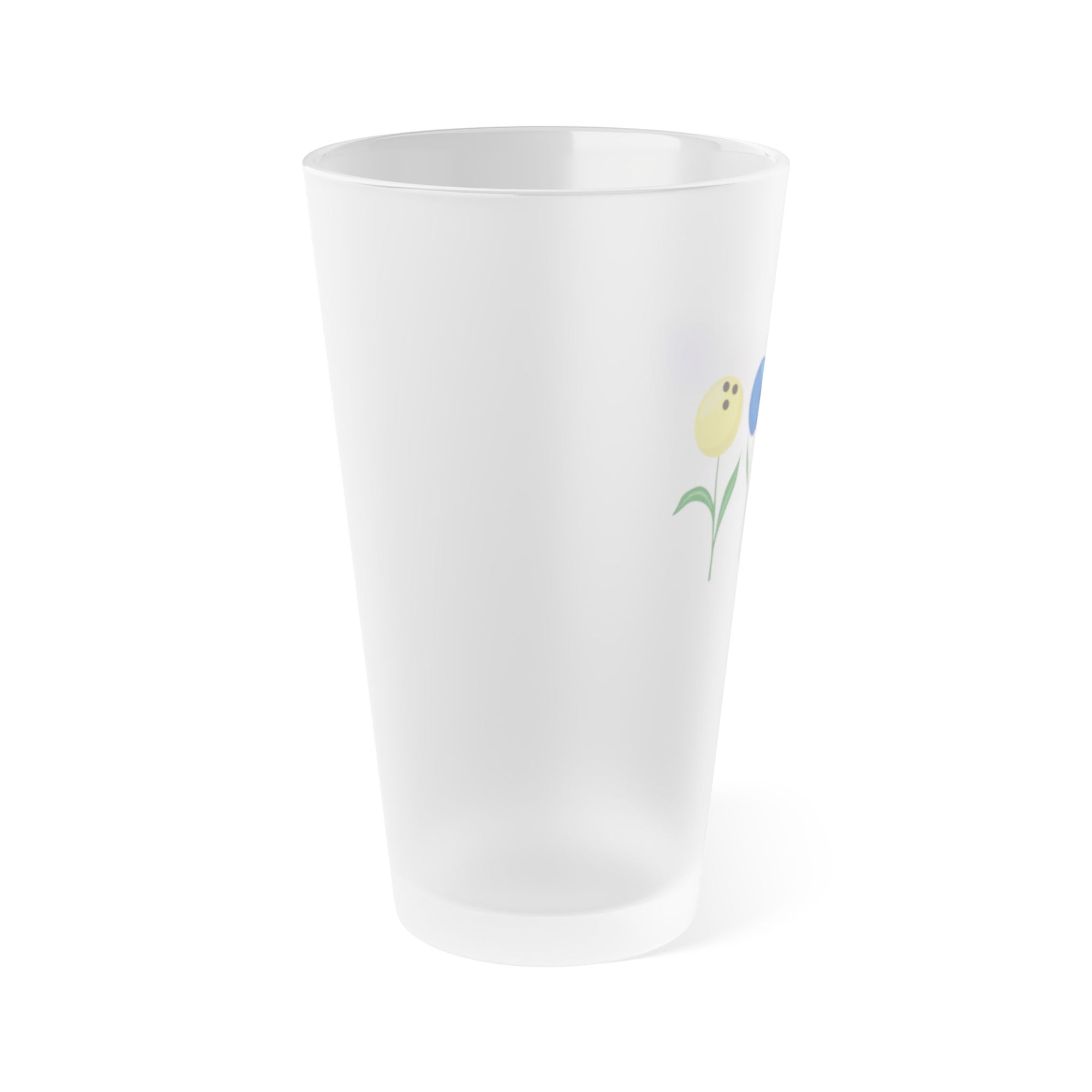 Side view of a frosted pint glass with colorful flowers made out of bowling balls, on a white background