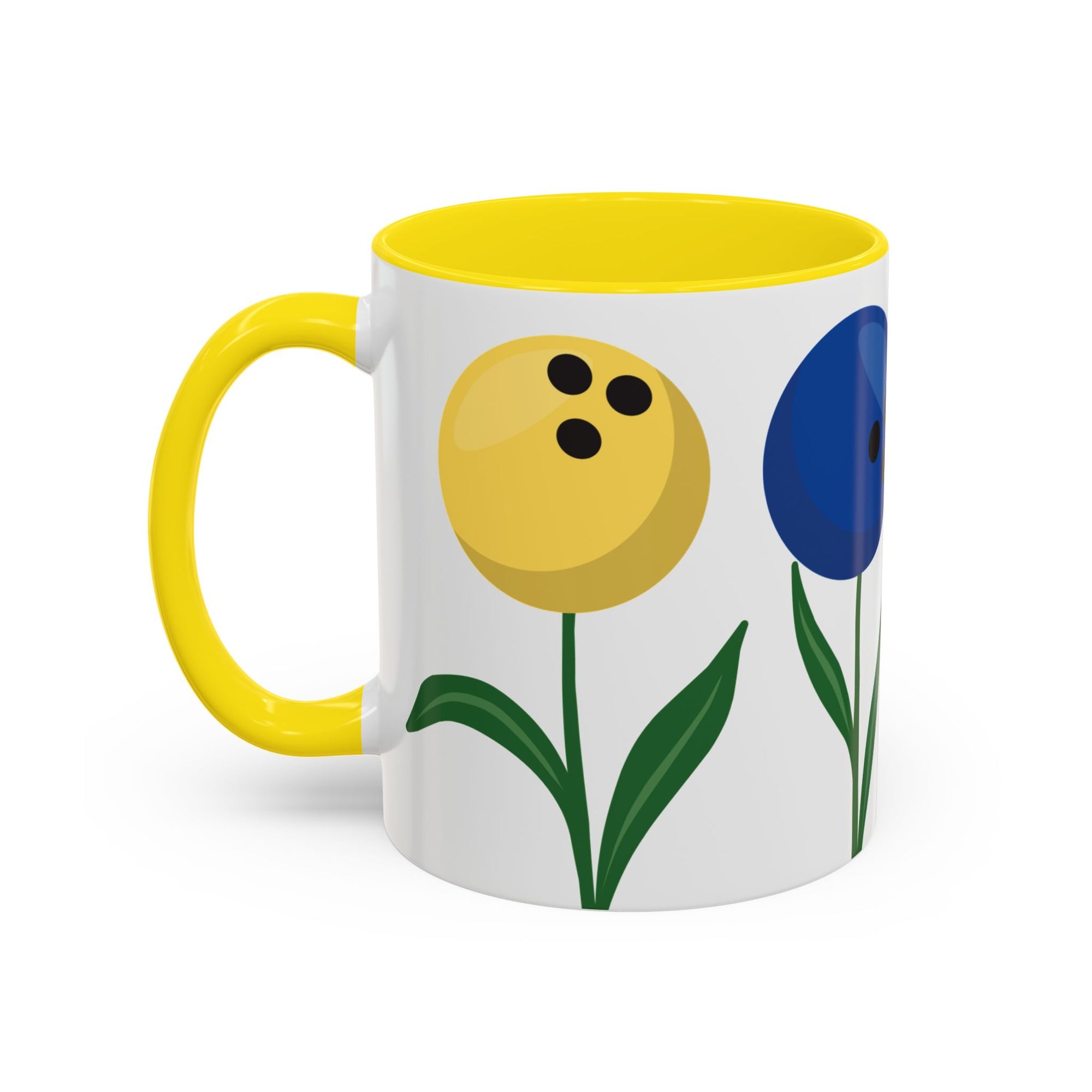 A white ceramic coffee mug with yellow accents on the handle and interior, with colorful flowers made out of bowling balls, on a white background