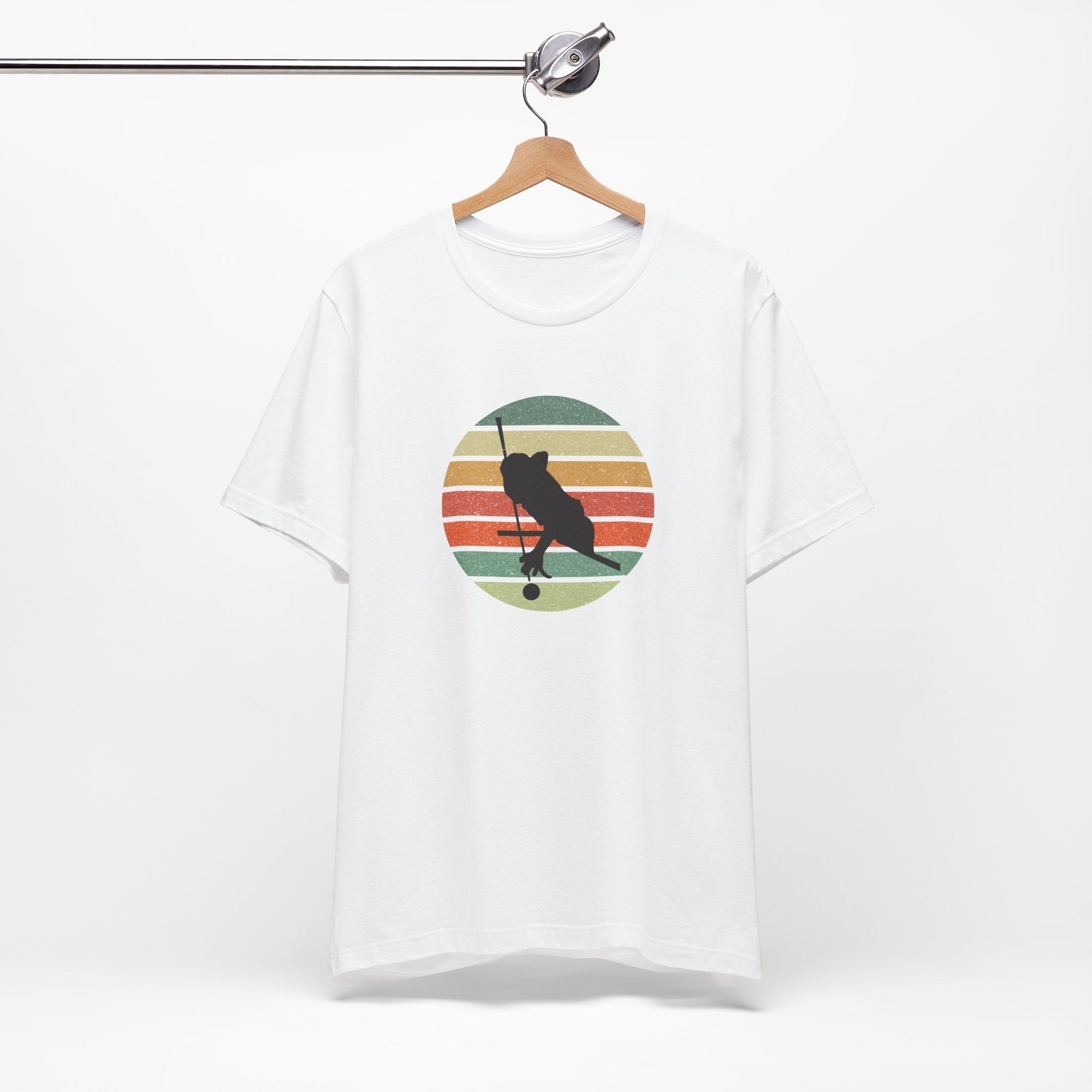 White t-shirt with a graphic of a billiards player silhouette over a colorful retro image against a white background