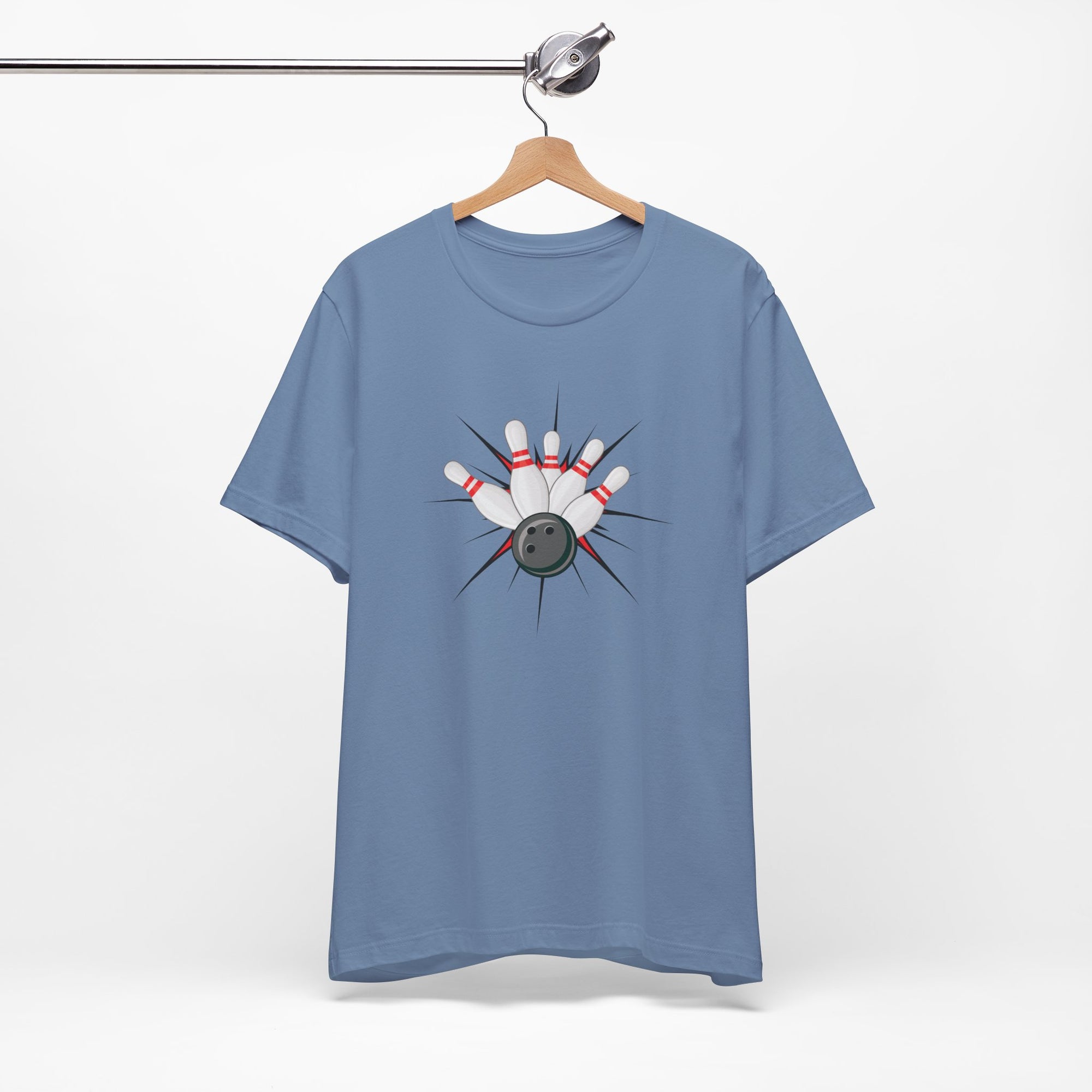 Steel blue t-shirt with a graphic design of a bowling ball smashing into pins on a hanger against a white background