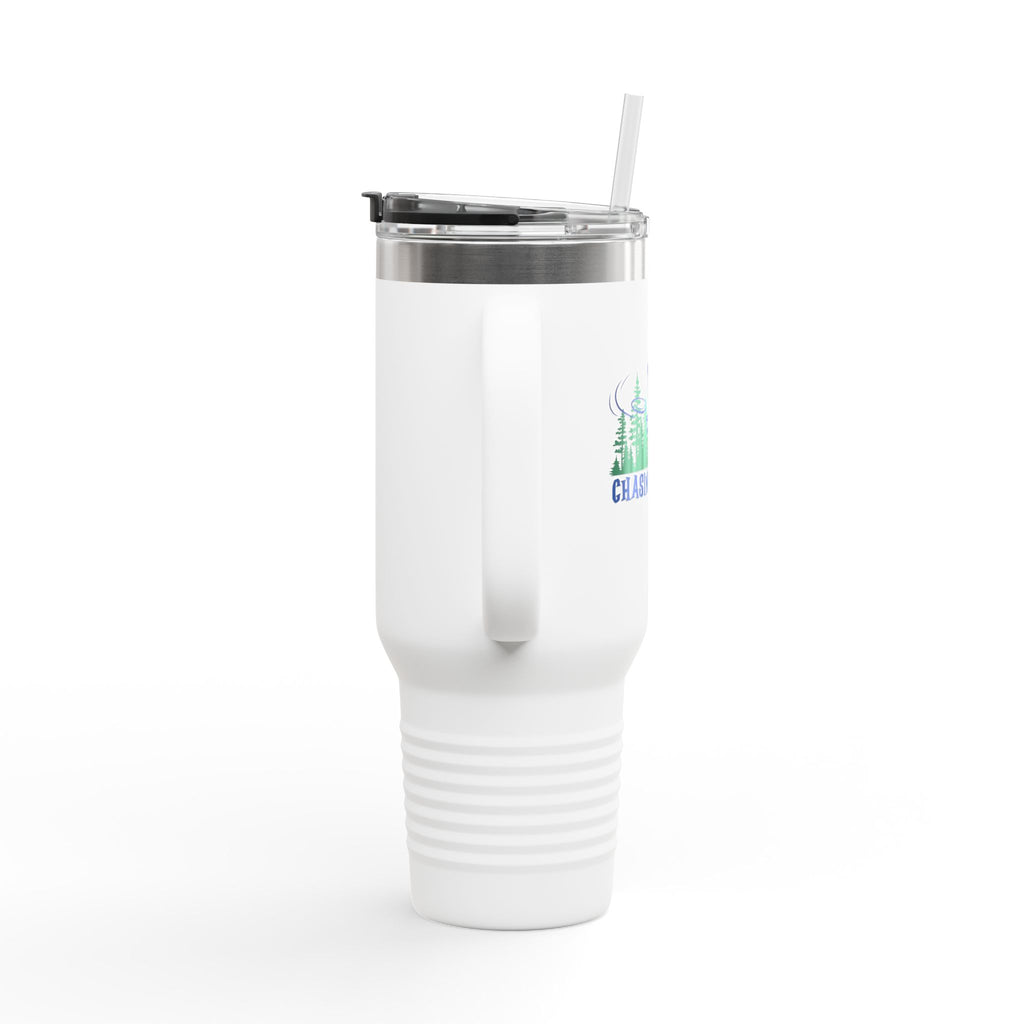 A white 40oz travel tumbler with lid and straw, with 'Chasing Chains' graphic featuring a flying disc golf disc and basket and chains in front of a scenic evergreen tree landscape, against a white background