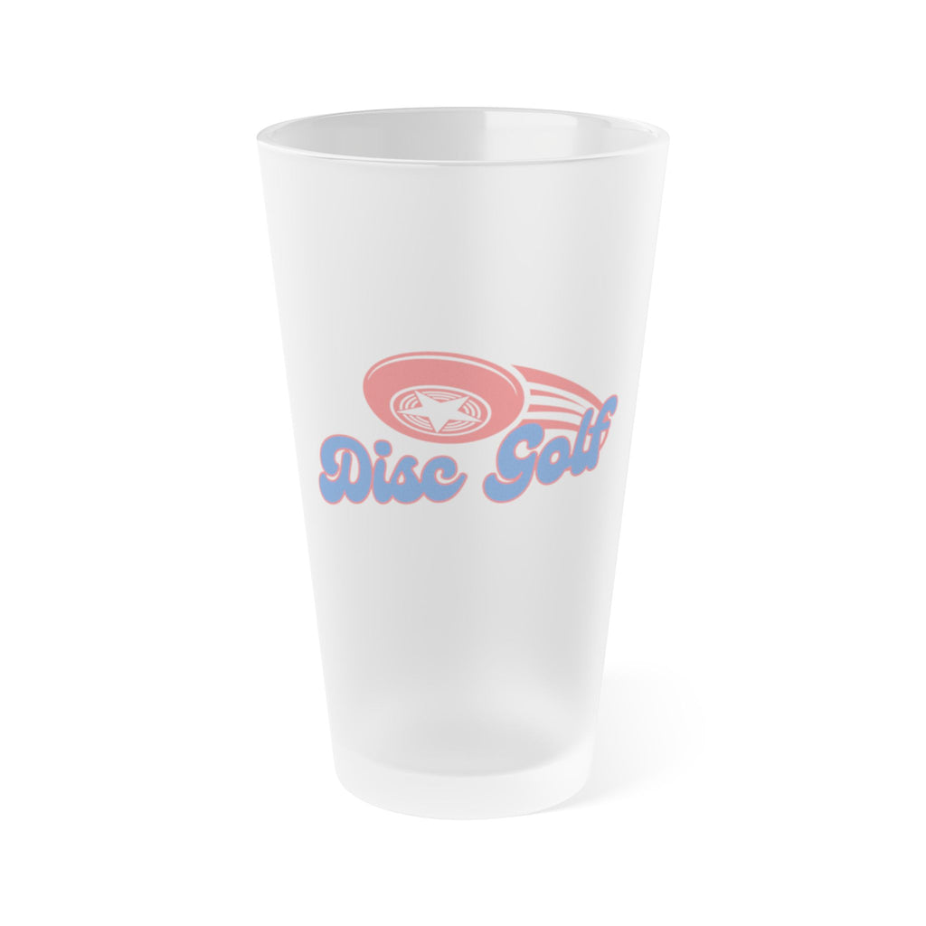 A frosted pint glass with "Disc Golf" in script font with a disc golf disc above it with motion trails, on a white background