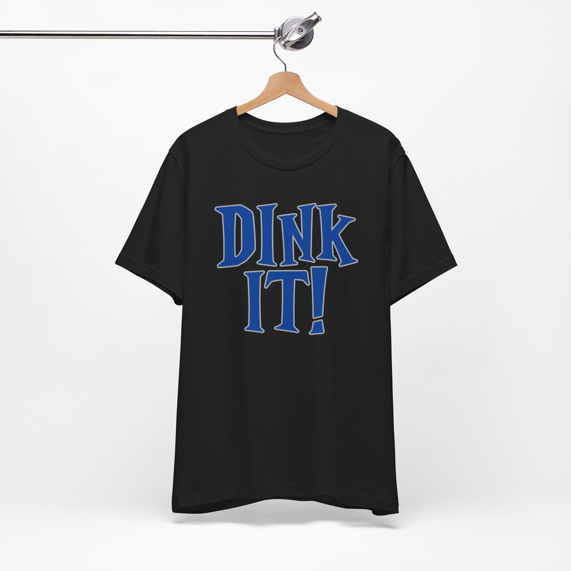 Black t-shirt with 'DINK IT!' text in blue and outlined in gray, on a hanger against a white background