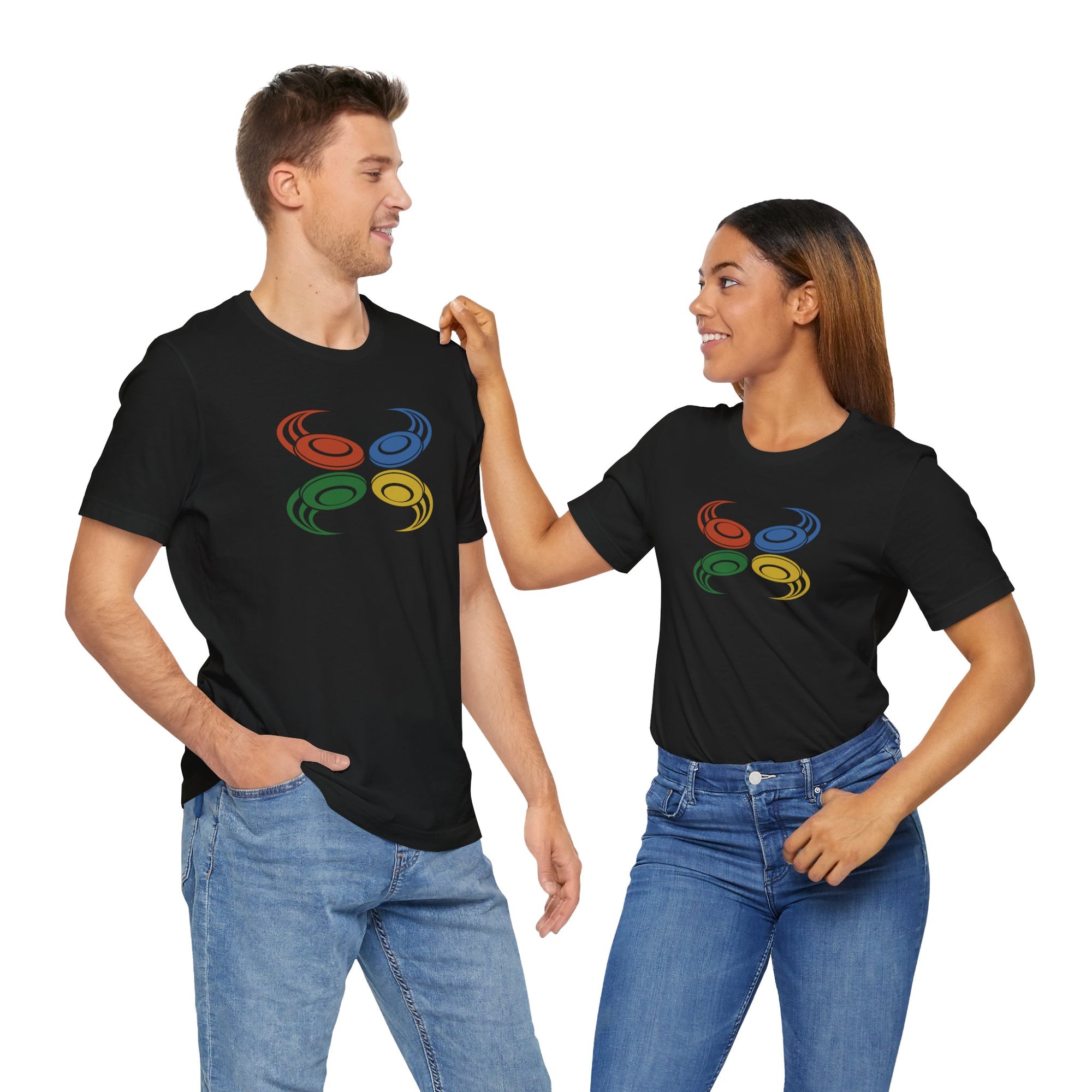 A man and a woman both wearing a black t-shirt with colorful graphic of flying disc golf discs, on a hanger against a white background