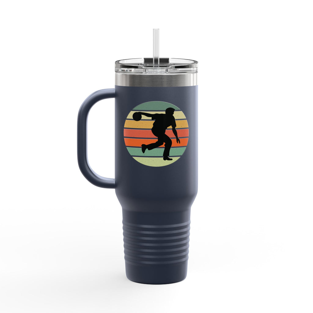 Blue travel mug with a silhouette of a bowler over an colorful retro image, on a white background.