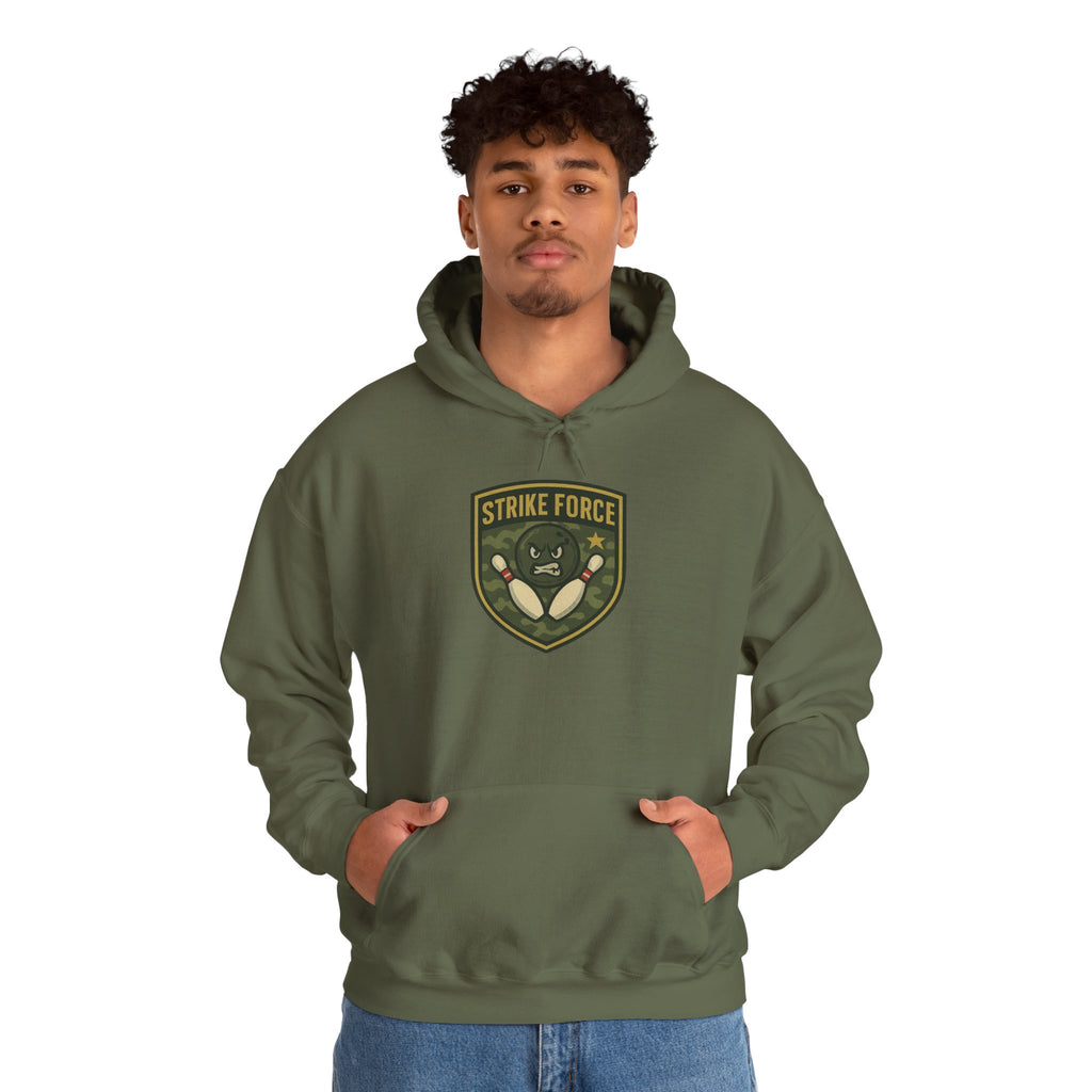A man wearing a military green hoodie with bowling 'Strike Force' military-style patch on a white background