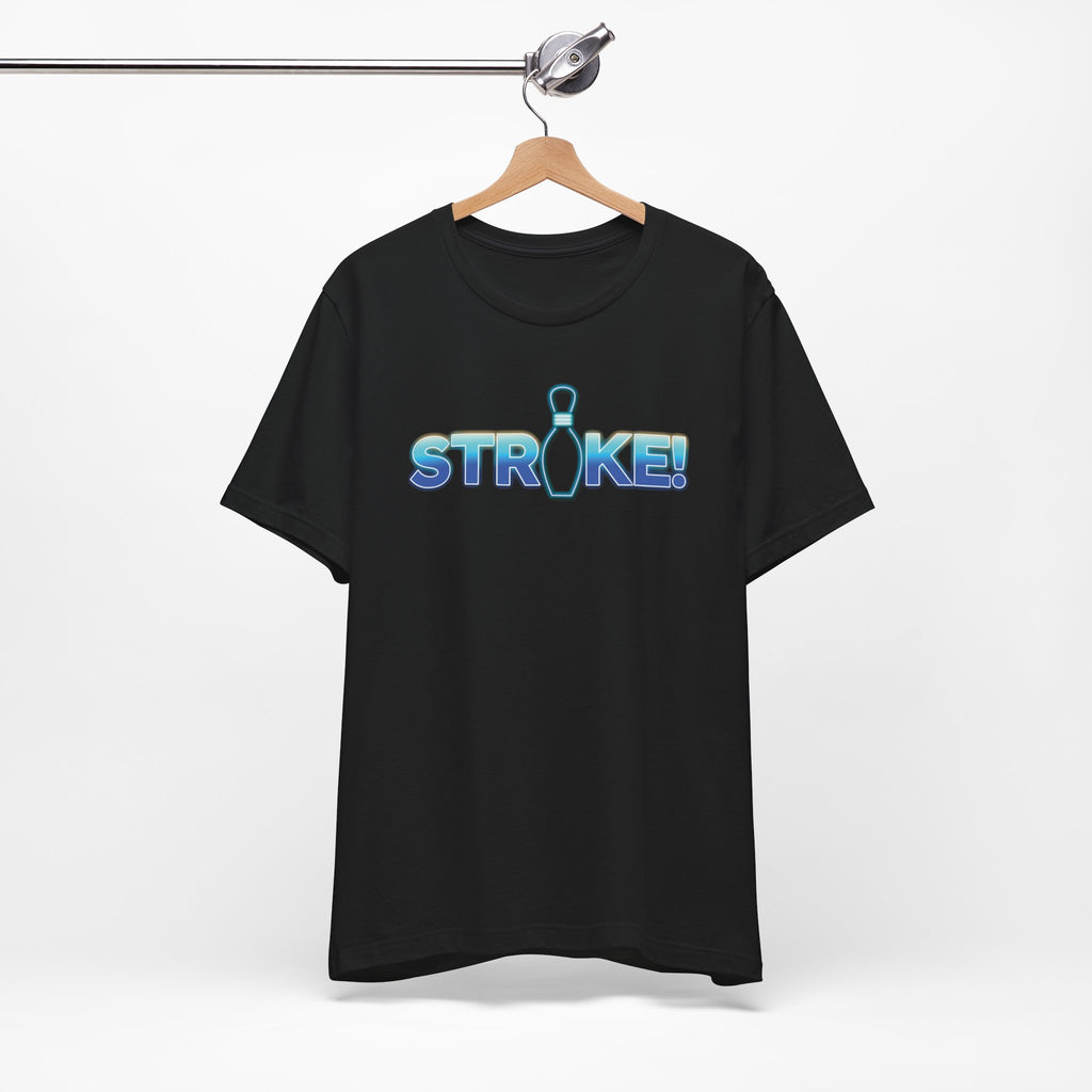 Black bowling t-shirt with 'STRIKE!' with the "I" replaced by a bowling pin, on a hanger against a white background