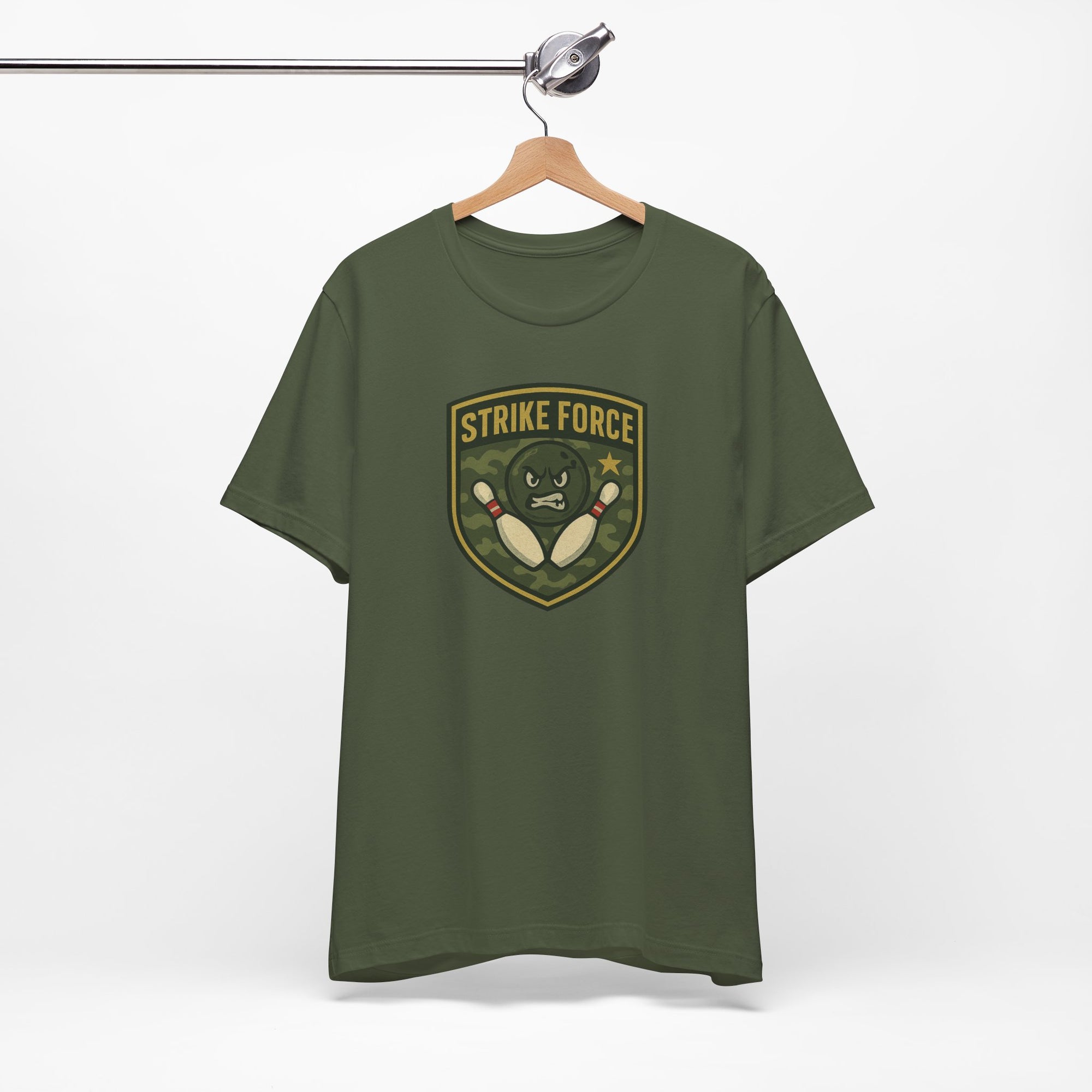 Military green t-shirt with bowling 'Strike Force' military-style patch on a hanger against a white background