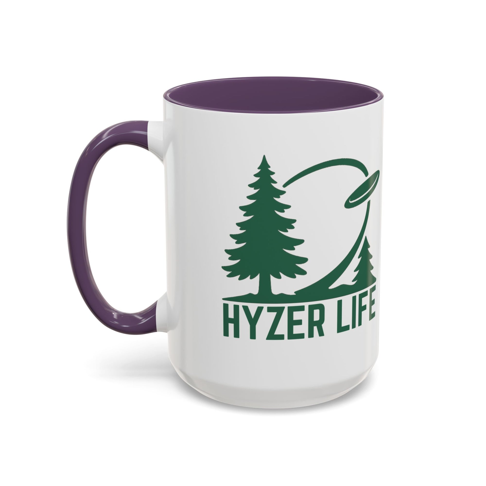 Ceramic coffee mug with purple accents on the handle and interior, with green graphic of trees and a disc golf flying with the words 'HYZER LIFE' below the image, against a white background