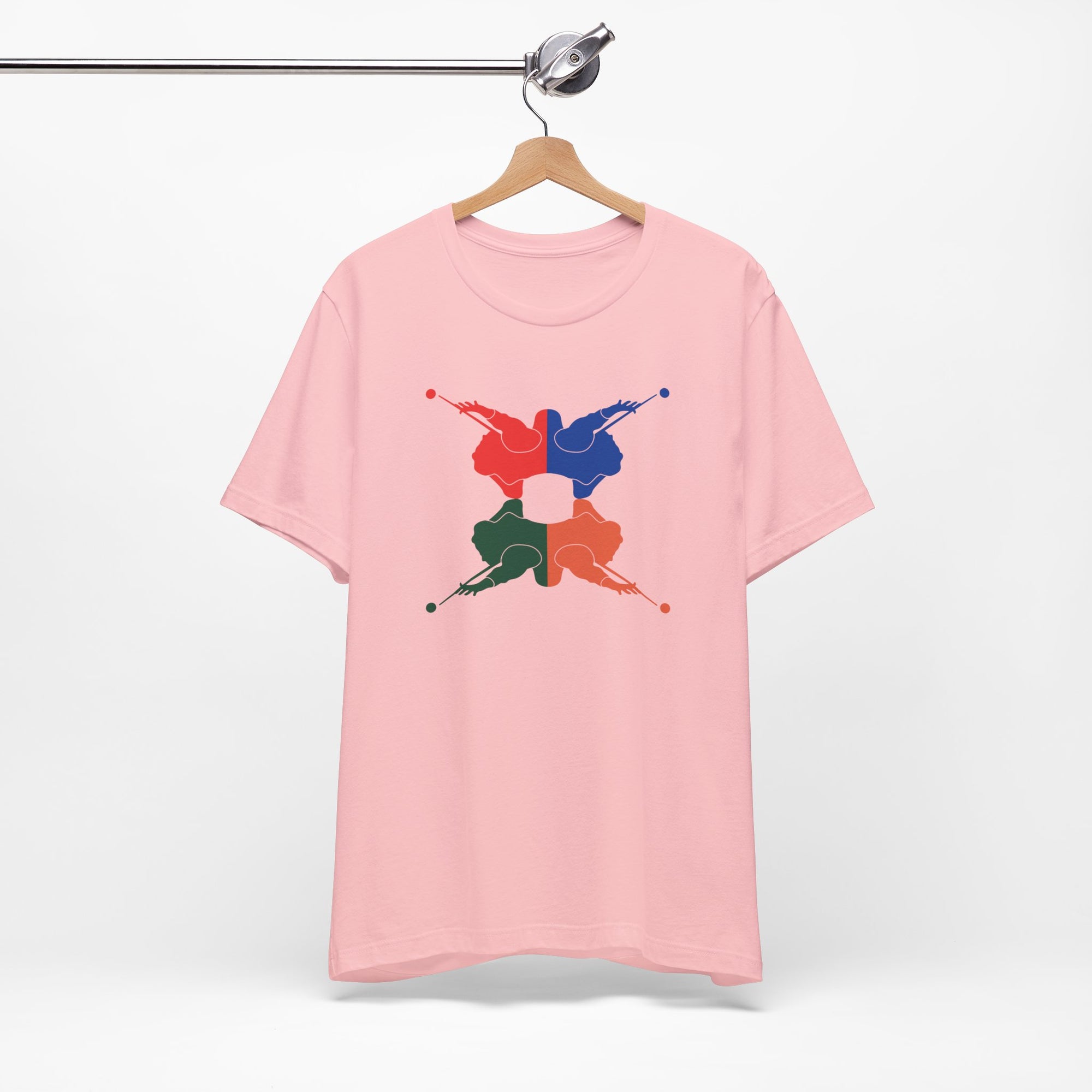 Pink t-shirt with colorful graphic of 4 billiards player silhouettes in a pop art style, on a hanger against a white background